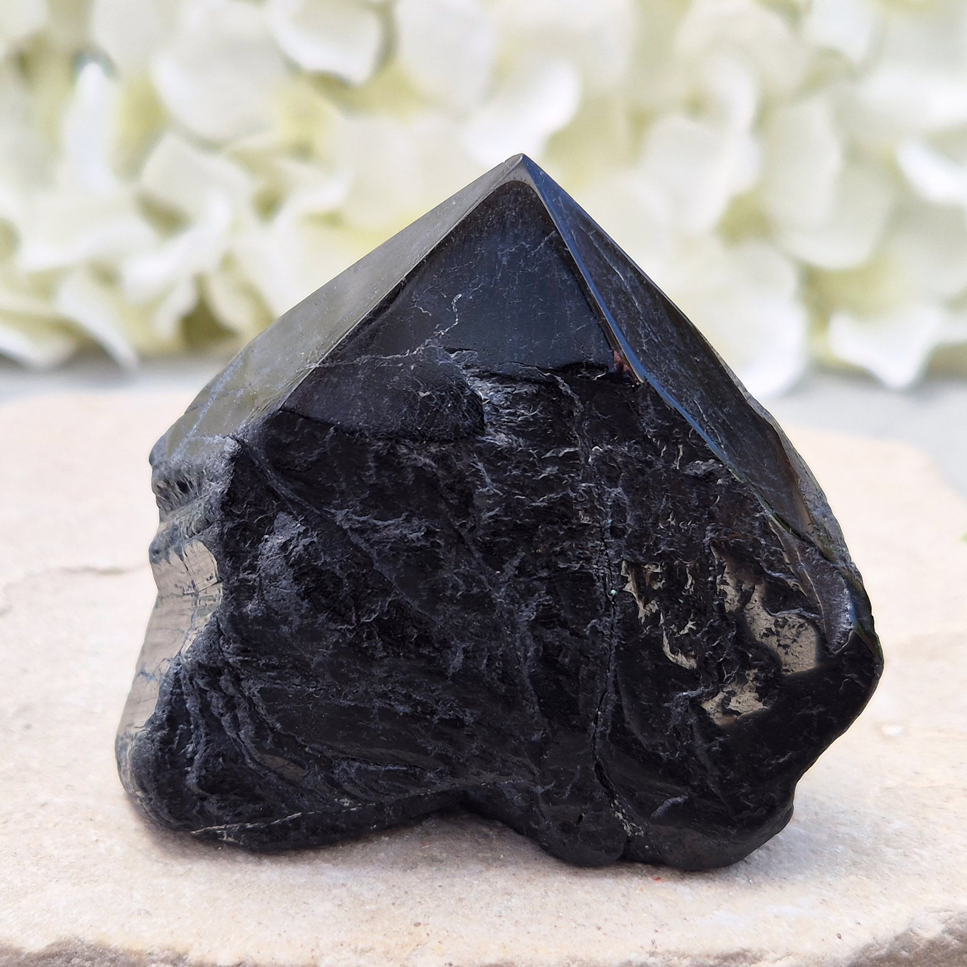 Hand-picked A grade Black Tourmaline standing point from a UK independent shop. Known for grounding energy — a striking, one-of-a-kind piece.