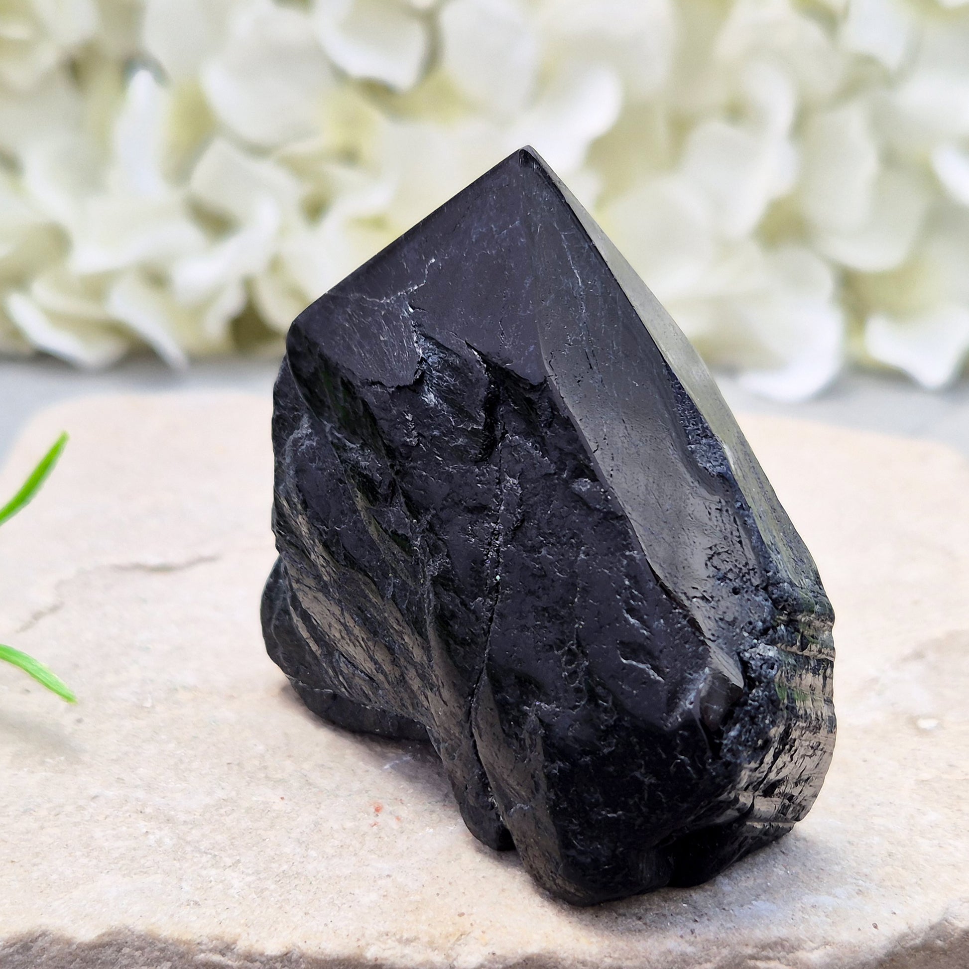 Hand-picked A grade Black Tourmaline standing point from a UK independent shop. Known for grounding energy — a striking, one-of-a-kind piece.