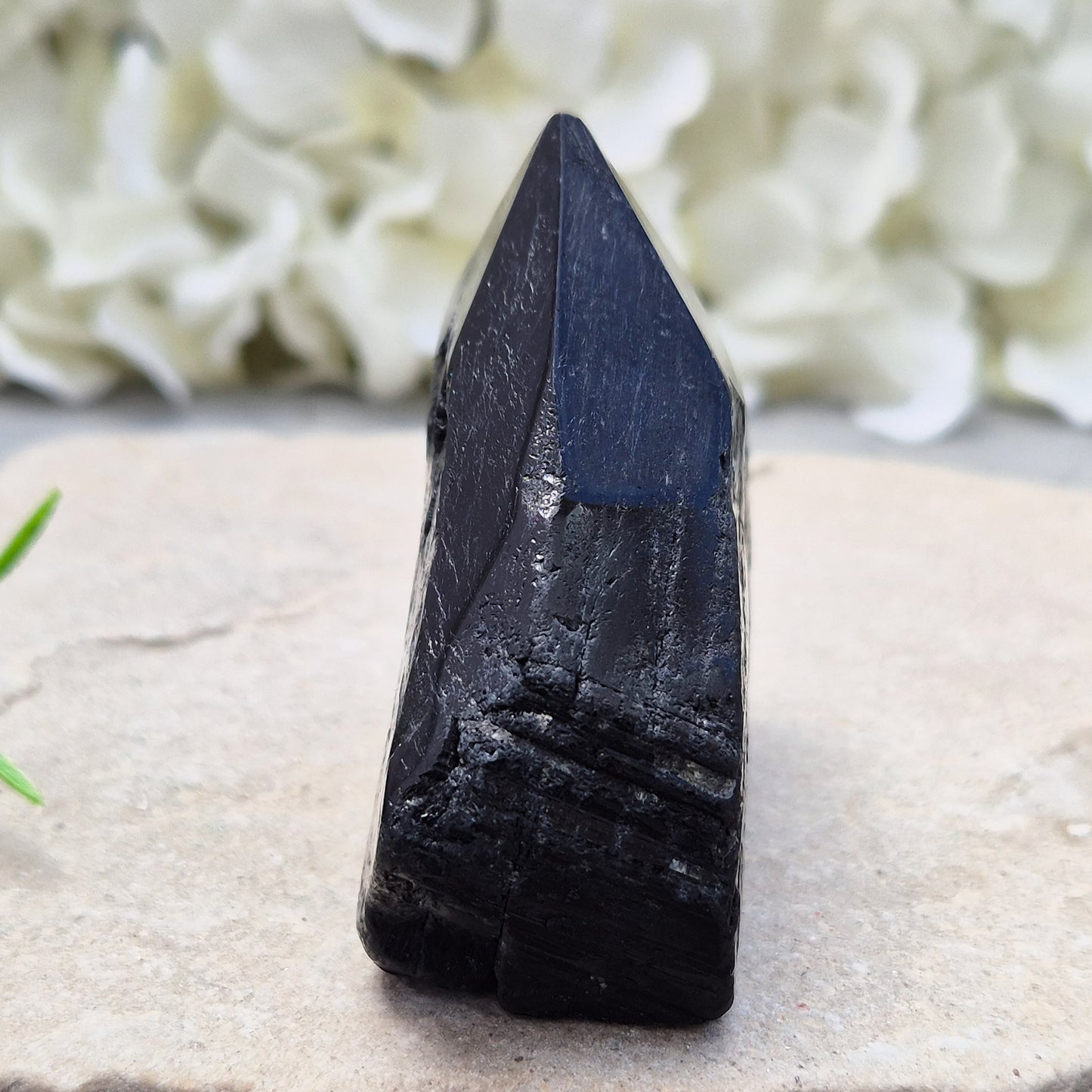 Hand-picked A grade Black Tourmaline standing point from a UK independent shop. Known for grounding energy — a striking, one-of-a-kind piece.