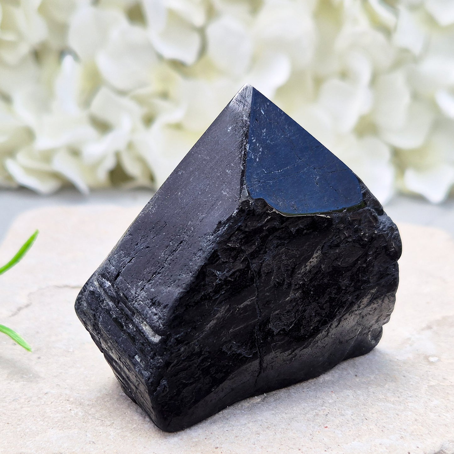 Hand-picked A grade Black Tourmaline standing point from a UK independent shop. Known for grounding energy — a striking, one-of-a-kind piece.