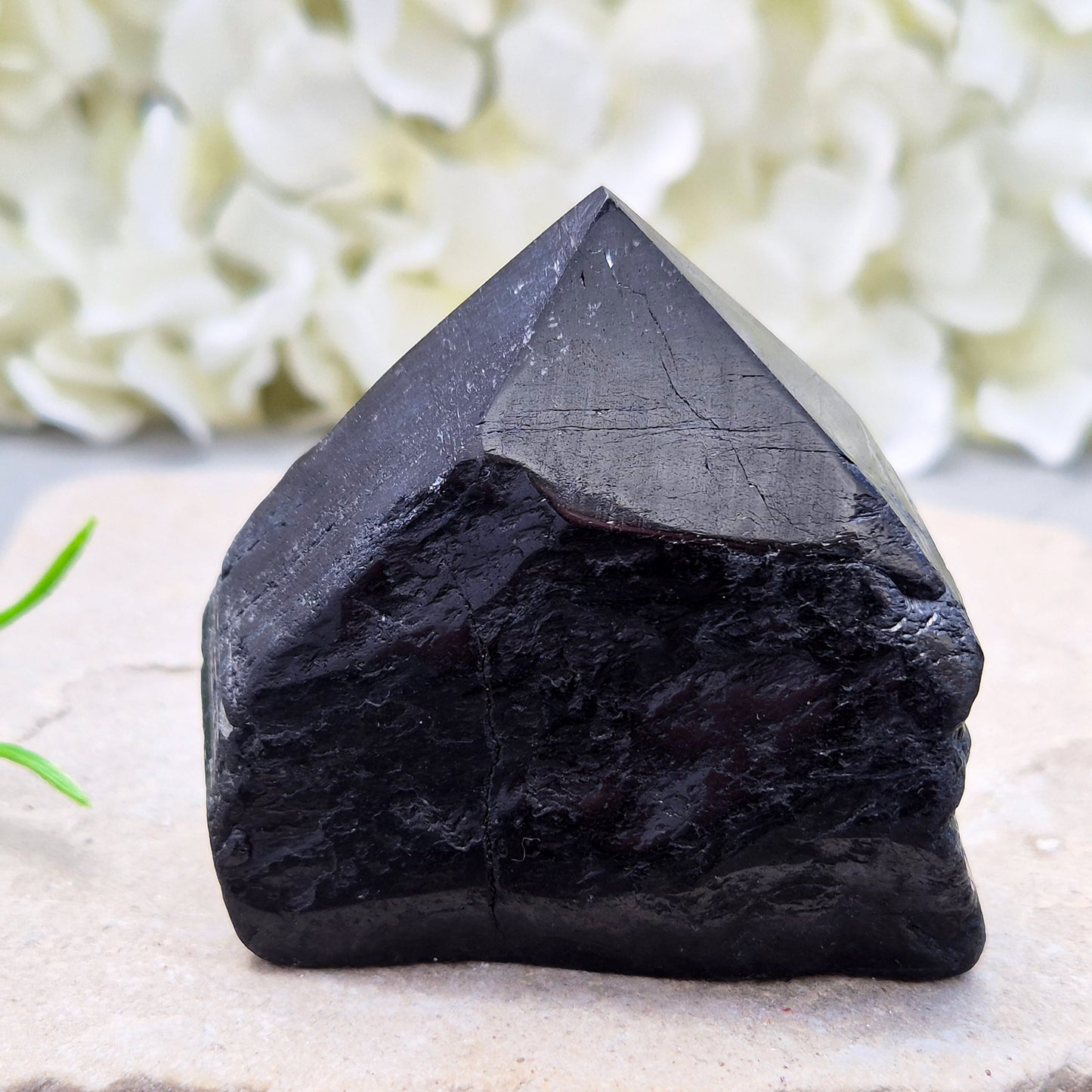 Hand-picked A grade Black Tourmaline standing point from a UK independent shop. Known for grounding energy — a striking, one-of-a-kind piece.