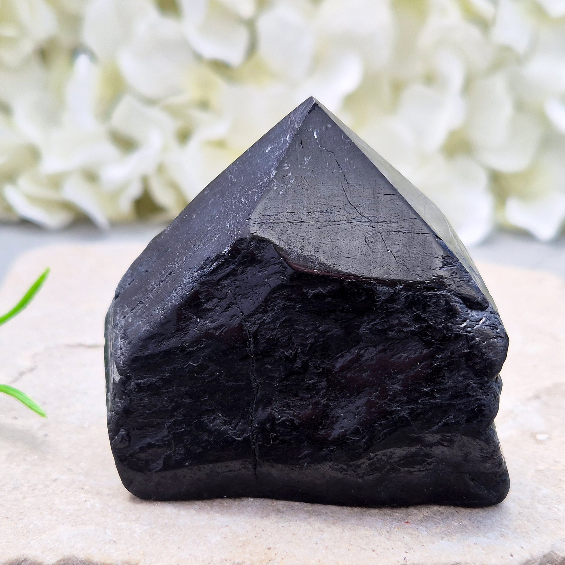 Hand-picked A grade Black Tourmaline standing point from a UK independent shop. Known for grounding energy — a striking, one-of-a-kind piece.