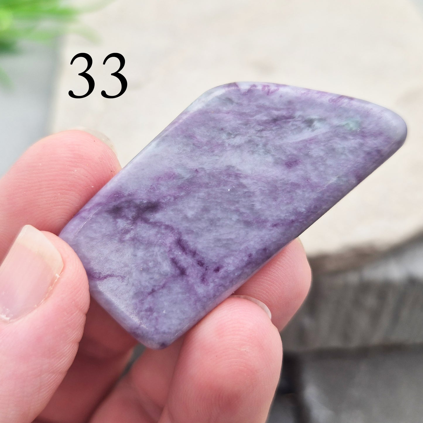 This polished Kammererite crystal slice comes from Turkey and reveals rich violet-purple tones, often accented with natural green inclusions of Chromite, Chlorite, or Serpentine. Sometimes referred to as Purple Seraphinite, these flat slices are smooth, lightweight, and easy to hold or carry in a pocket.