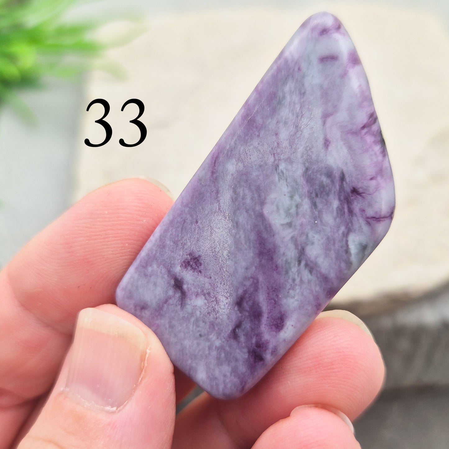 This polished Kammererite crystal slice comes from Turkey and reveals rich violet-purple tones, often accented with natural green inclusions of Chromite, Chlorite, or Serpentine. Sometimes referred to as Purple Seraphinite, these flat slices are smooth, lightweight, and easy to hold or carry in a pocket.