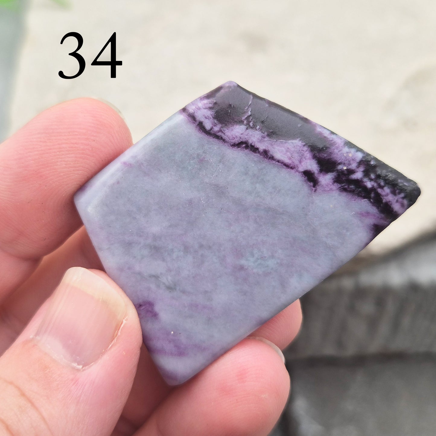 This polished Kammererite crystal slice comes from Turkey and reveals rich violet-purple tones, often accented with natural green inclusions of Chromite, Chlorite, or Serpentine. Sometimes referred to as Purple Seraphinite, these flat slices are smooth, lightweight, and easy to hold or carry in a pocket.