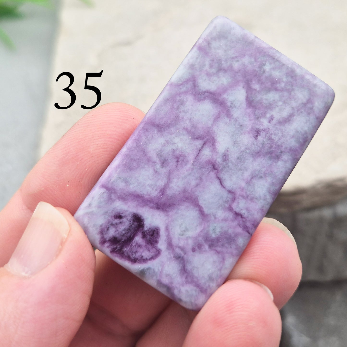 This polished Kammererite crystal slice comes from Turkey and reveals rich violet-purple tones, often accented with natural green inclusions of Chromite, Chlorite, or Serpentine. Sometimes referred to as Purple Seraphinite, these flat slices are smooth, lightweight, and easy to hold or carry in a pocket.