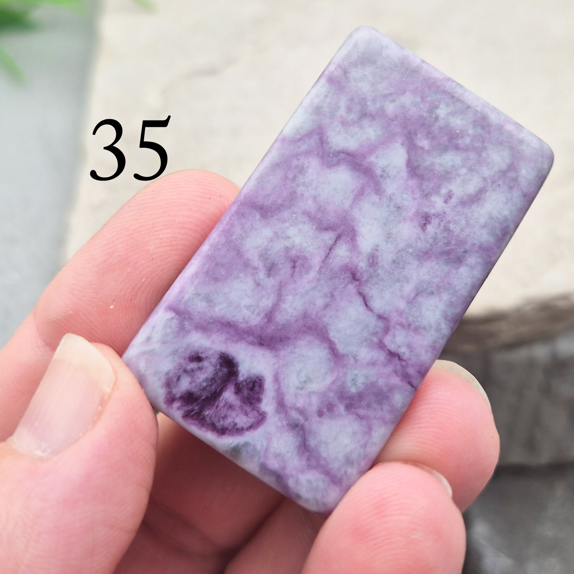 This polished Kammererite crystal slice comes from Turkey and reveals rich violet-purple tones, often accented with natural green inclusions of Chromite, Chlorite, or Serpentine. Sometimes referred to as Purple Seraphinite, these flat slices are smooth, lightweight, and easy to hold or carry in a pocket.