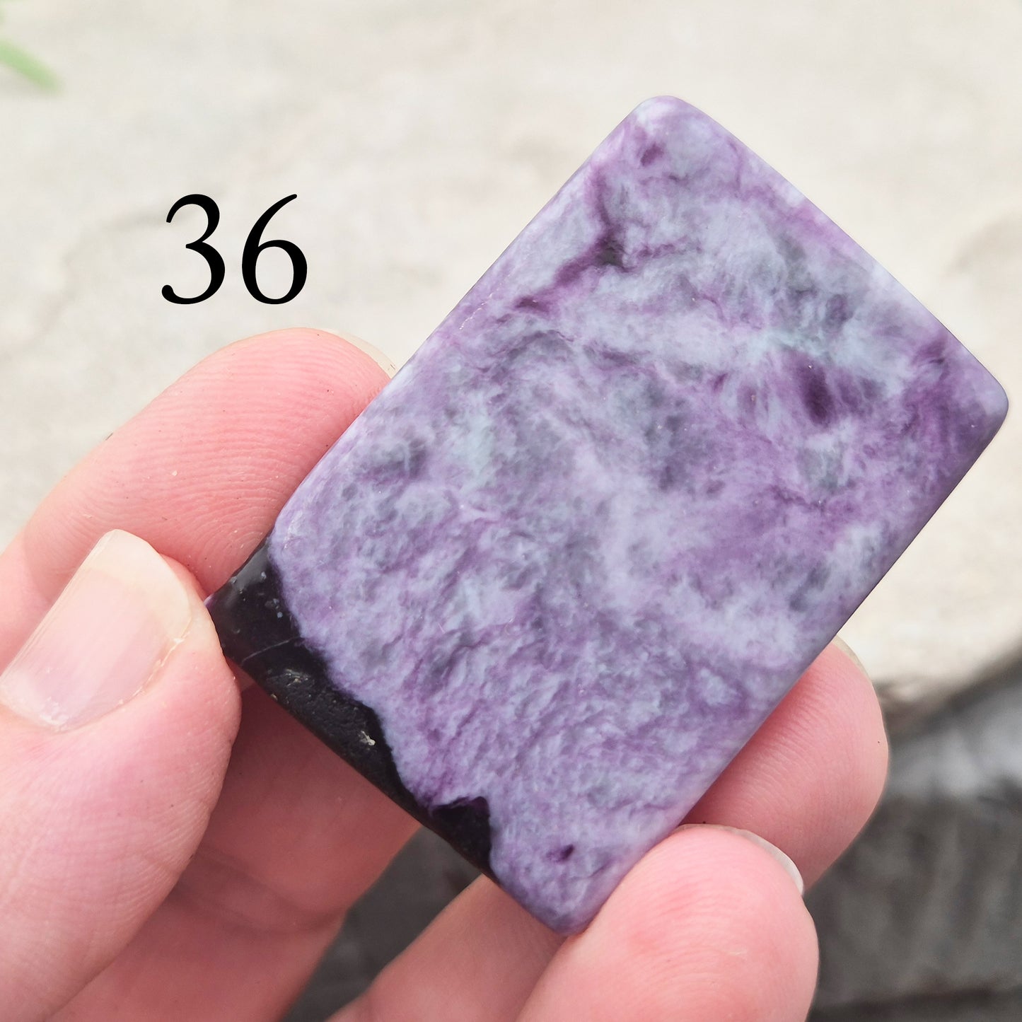 This polished Kammererite crystal slice comes from Turkey and reveals rich violet-purple tones, often accented with natural green inclusions of Chromite, Chlorite, or Serpentine. Sometimes referred to as Purple Seraphinite, these flat slices are smooth, lightweight, and easy to hold or carry in a pocket.