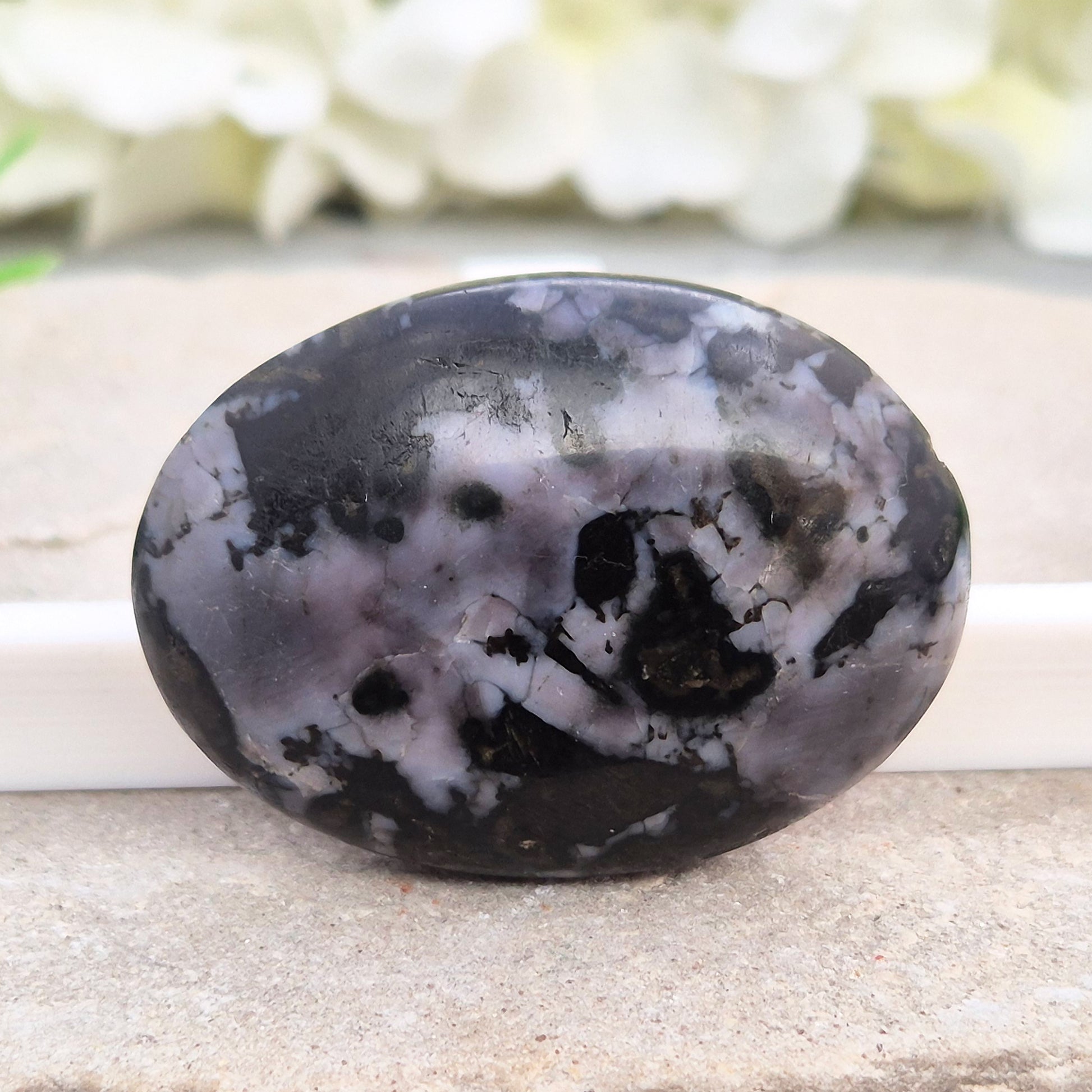 Mystic Merlinite (indigo gabbro) palm stone for energy work, intuition & emotional healing. Ideal for meditation, grounding & spiritual growth.