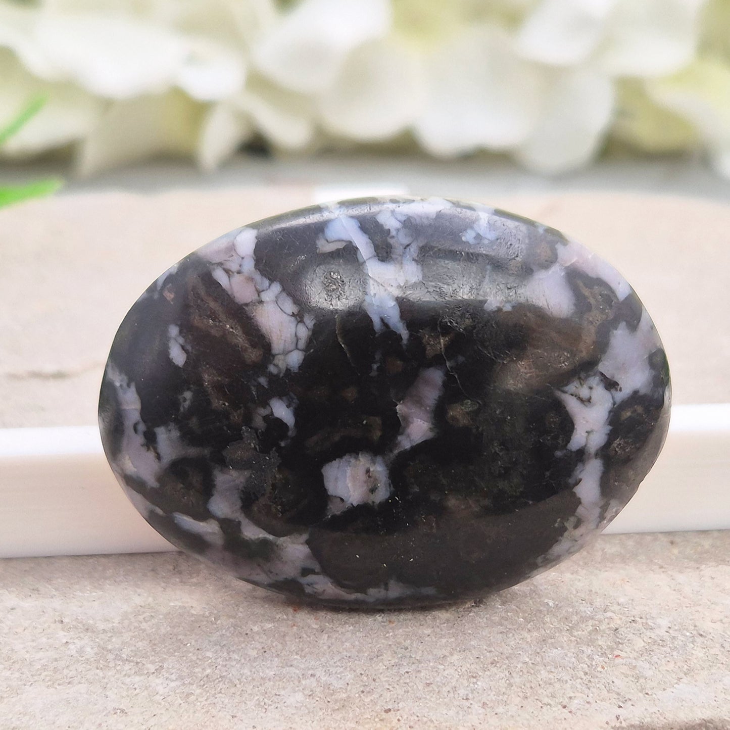 Mystic Merlinite (indigo gabbro) palm stone for energy work, intuition & emotional healing. Ideal for meditation, grounding & spiritual growth.