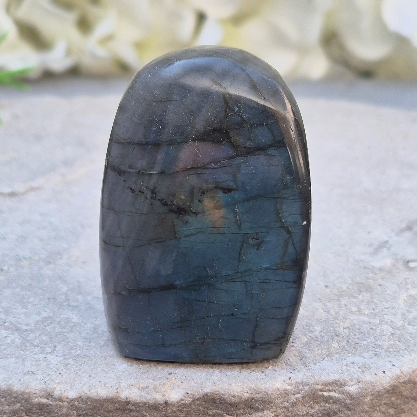 Labradorite Crystal Freeform with flashes of blue and yellow. Labradorite is often chosen during times of change, reflection, or personal growth. 