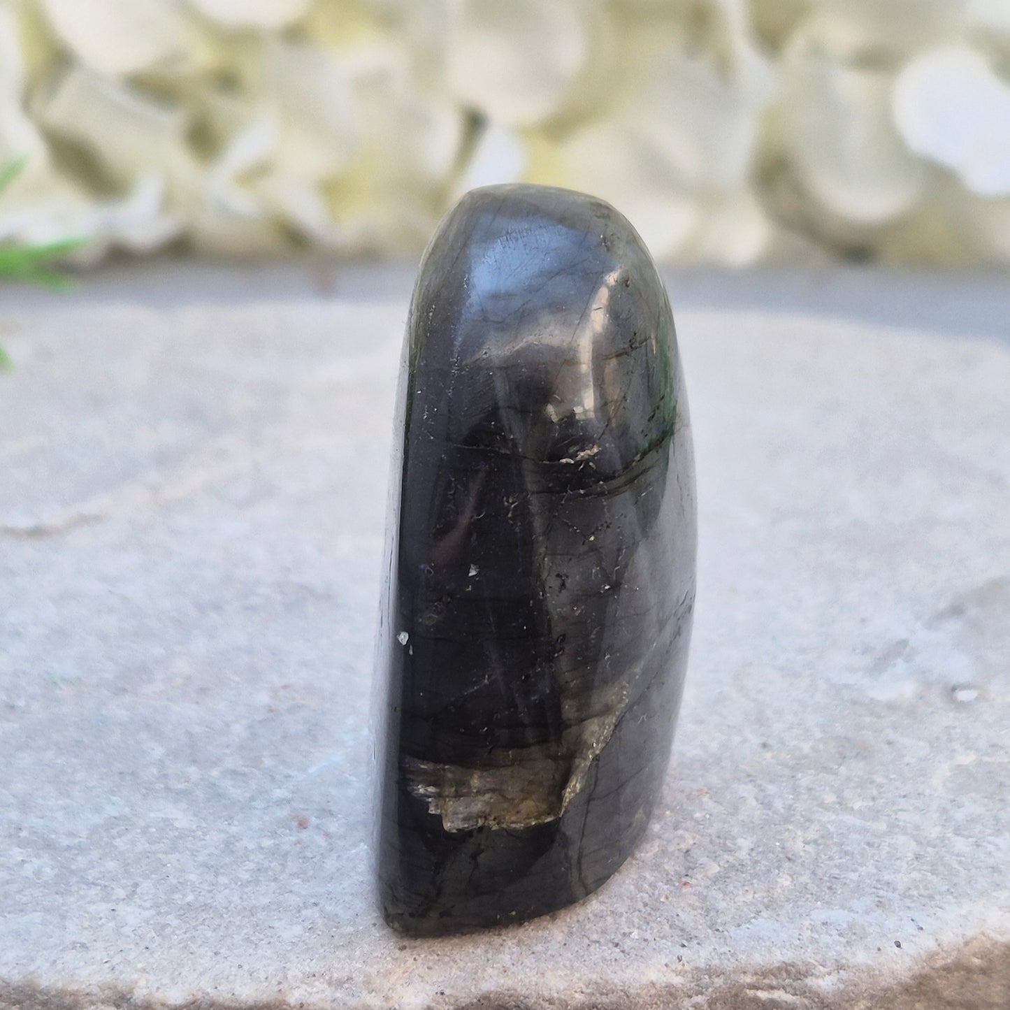 Labradorite Crystal Freeform with flashes of blue and yellow. Labradorite is often chosen during times of change, reflection, or personal growth. 