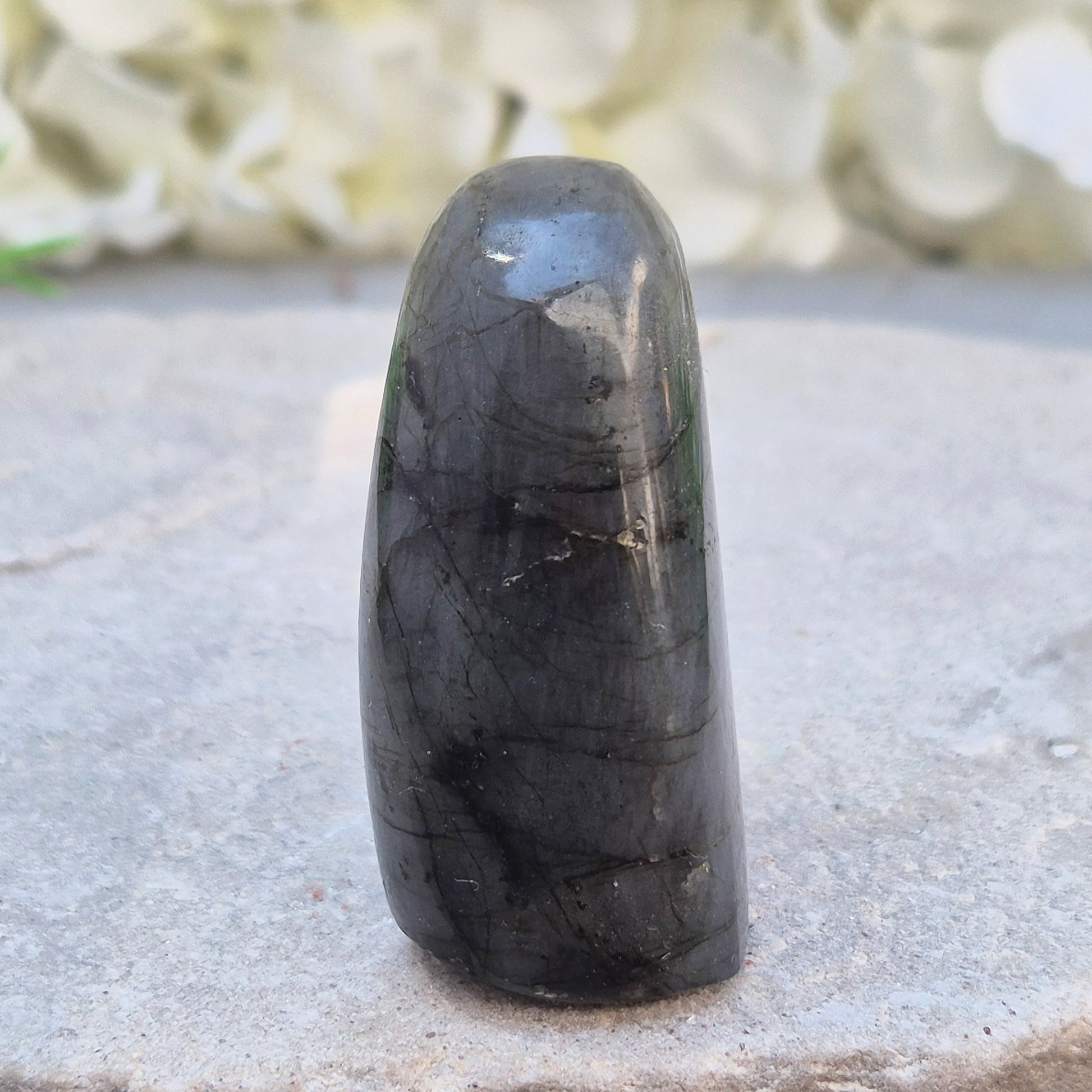 Labradorite Crystal Freeform with flashes of blue and yellow. Labradorite is often chosen during times of change, reflection, or personal growth. 