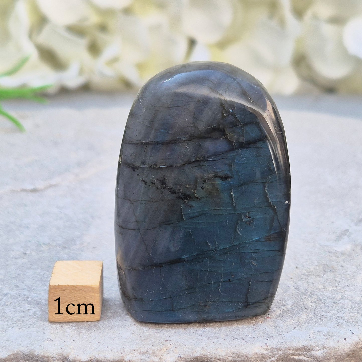 Labradorite Crystal Freeform with flashes of blue and yellow. Labradorite is often chosen during times of change, reflection, or personal growth. 