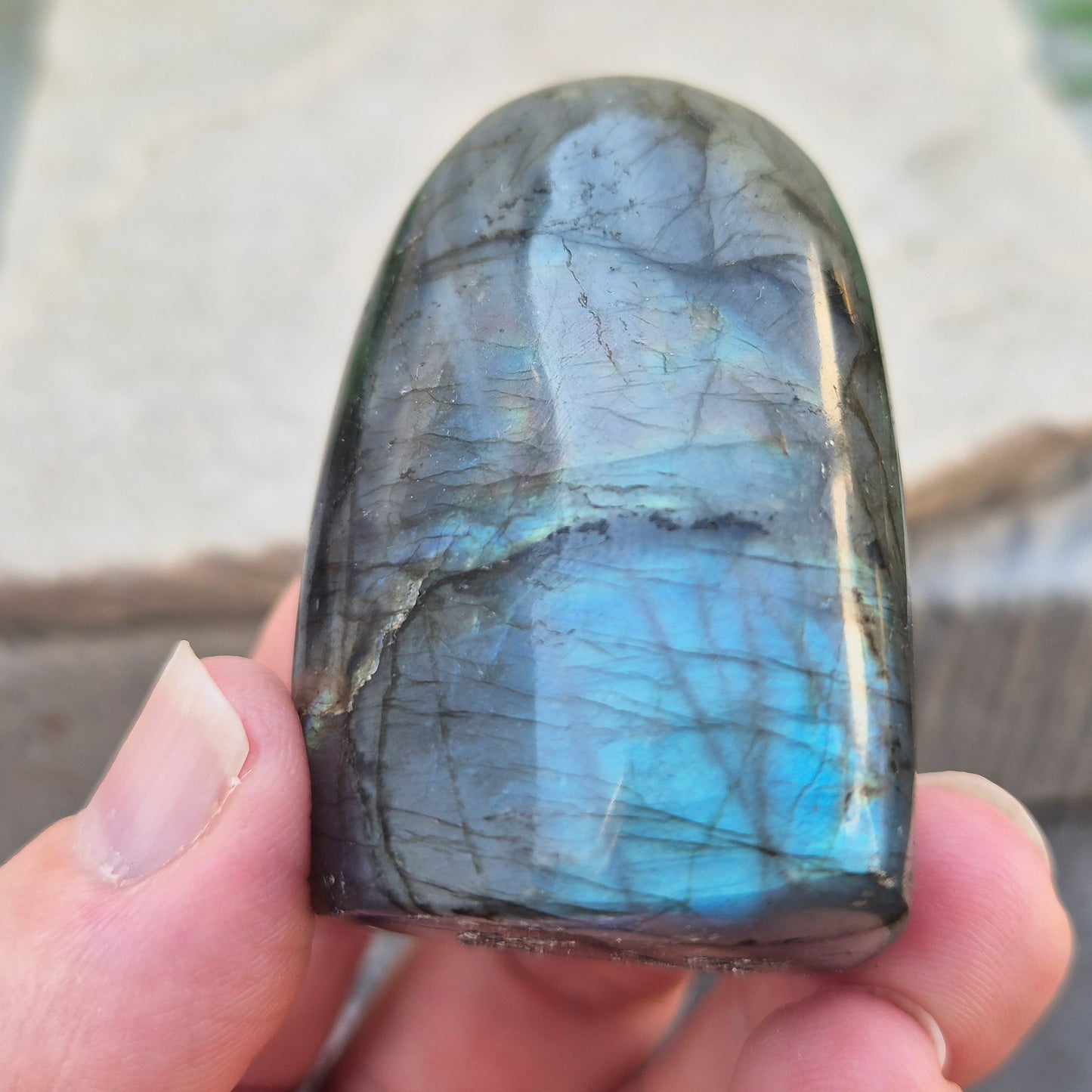 Labradorite Crystal Freeform with flashes of blue and yellow. Labradorite is often chosen during times of change, reflection, or personal growth. 