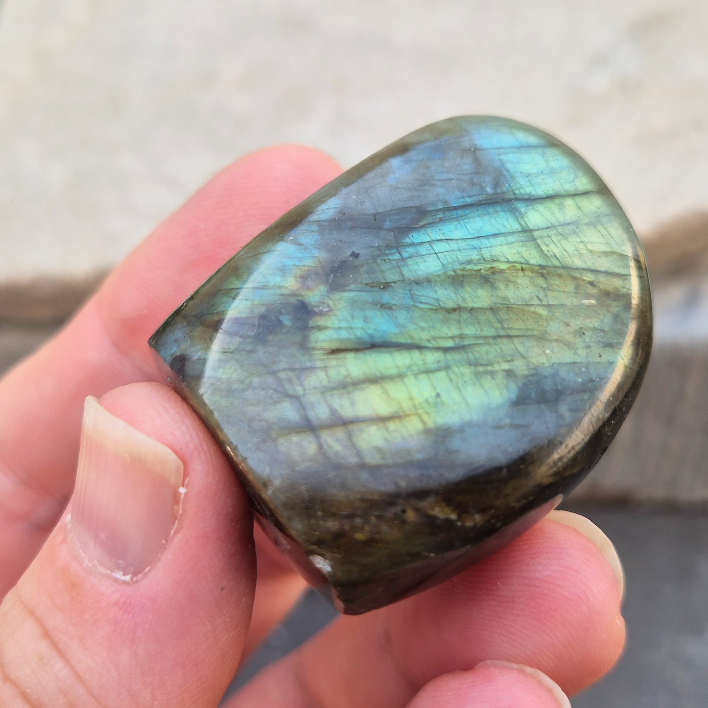 Labradorite freeform crystal with flashes of colour. Supports intuition, focus, and spiritual balance. Perfect for display or energy work.