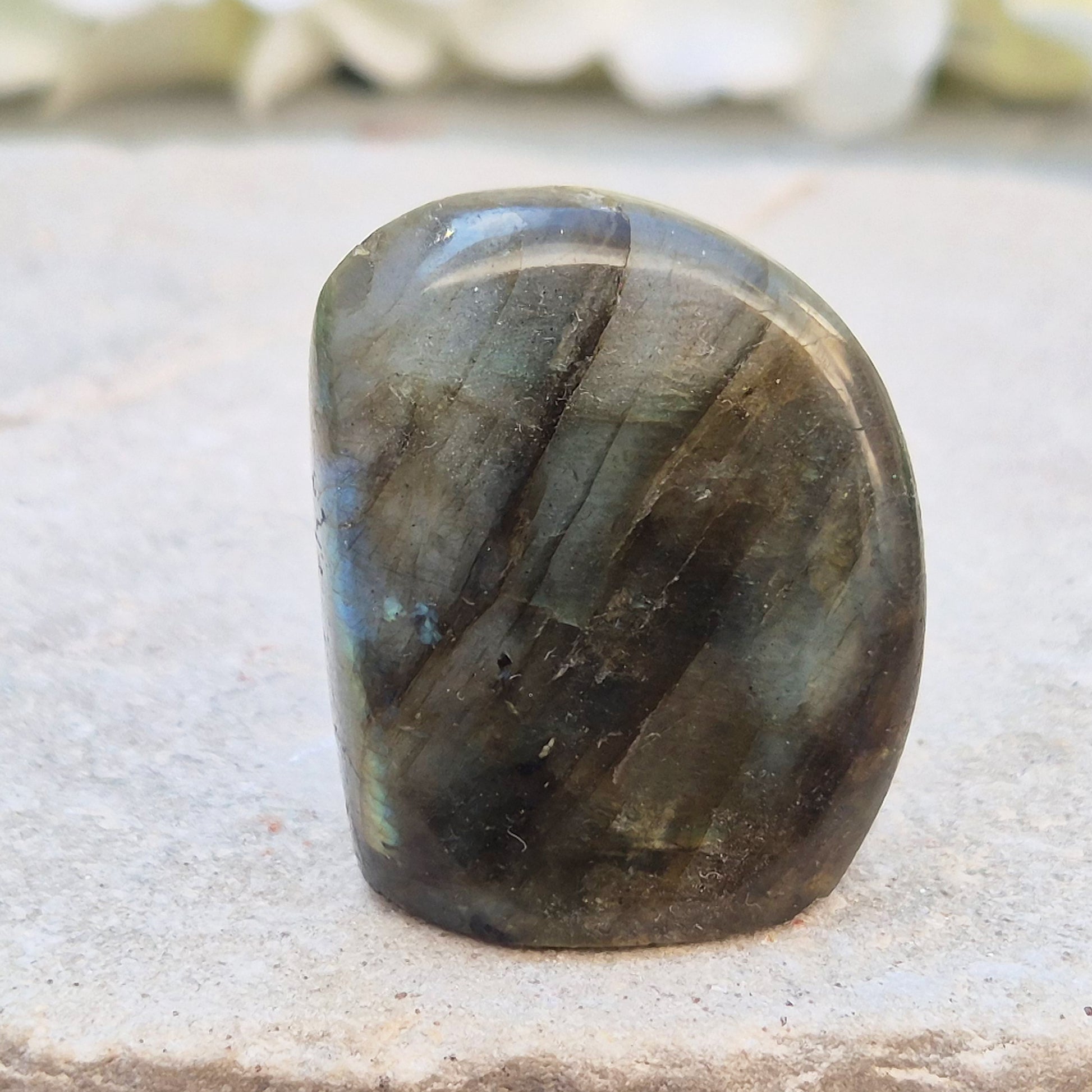 Labradorite freeform crystal with flashes of colour. Supports intuition, focus, and spiritual balance. Perfect for display or energy work.