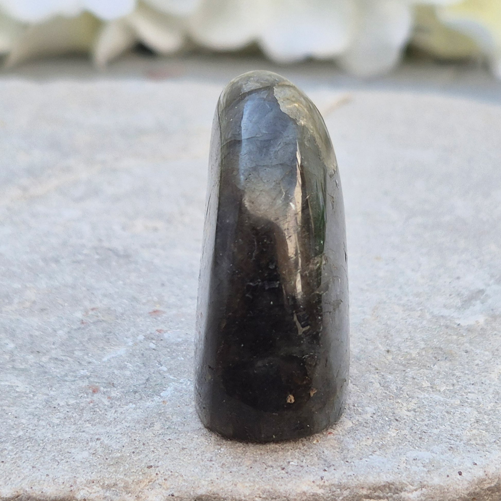 Labradorite freeform crystal with flashes of colour. Supports intuition, focus, and spiritual balance. Perfect for display or energy work.