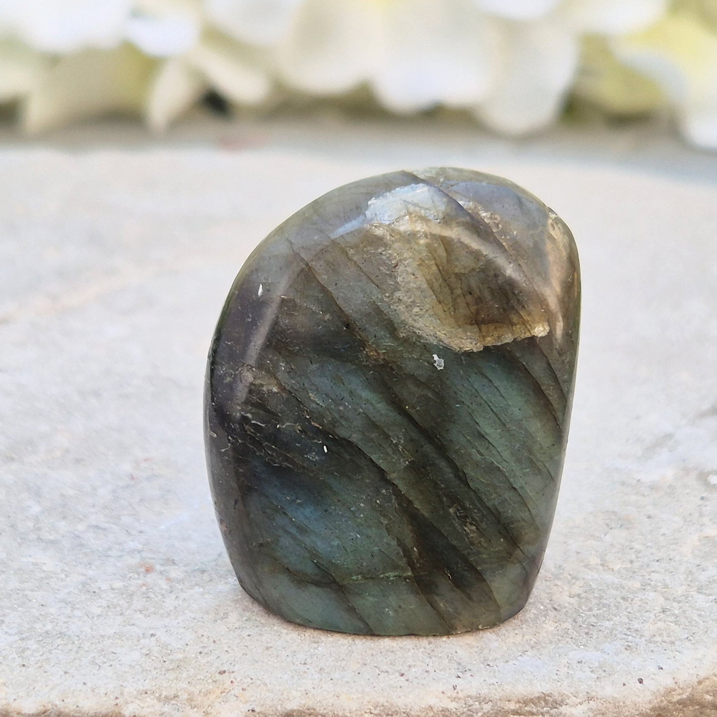 Labradorite freeform crystal with flashes of colour. Supports intuition, focus, and spiritual balance. Perfect for display or energy work.