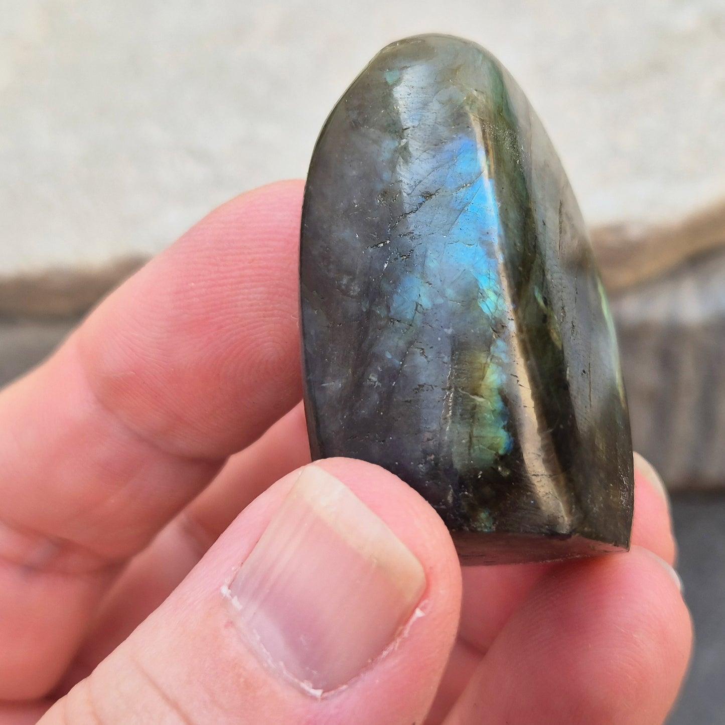 Labradorite freeform crystal with flashes of colour. Supports intuition, focus, and spiritual balance. Perfect for display or energy work.