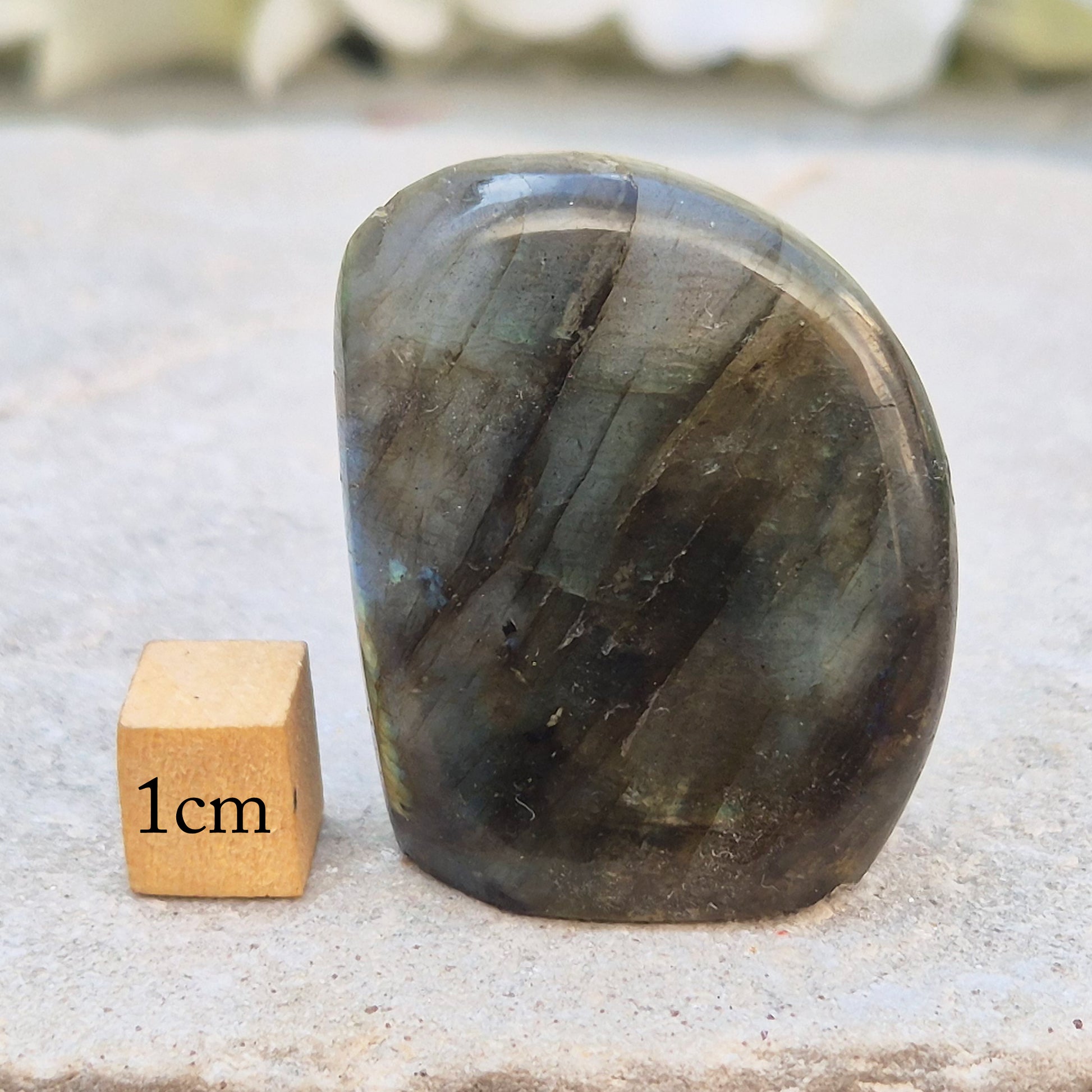 Labradorite freeform crystal with flashes of colour. Supports intuition, focus, and spiritual balance. Perfect for display or energy work.