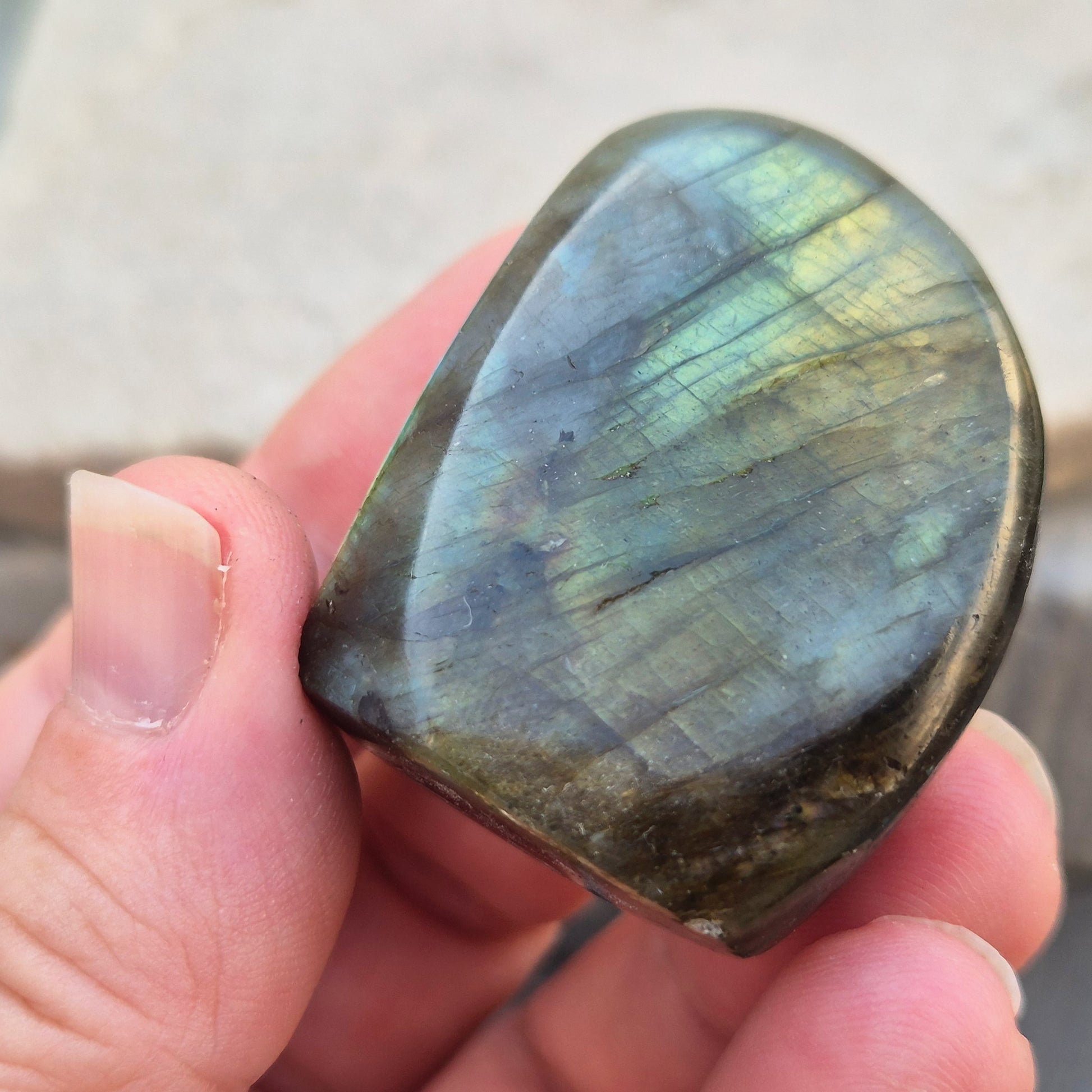 Labradorite freeform crystal with flashes of colour. Supports intuition, focus, and spiritual balance. Perfect for display or energy work.