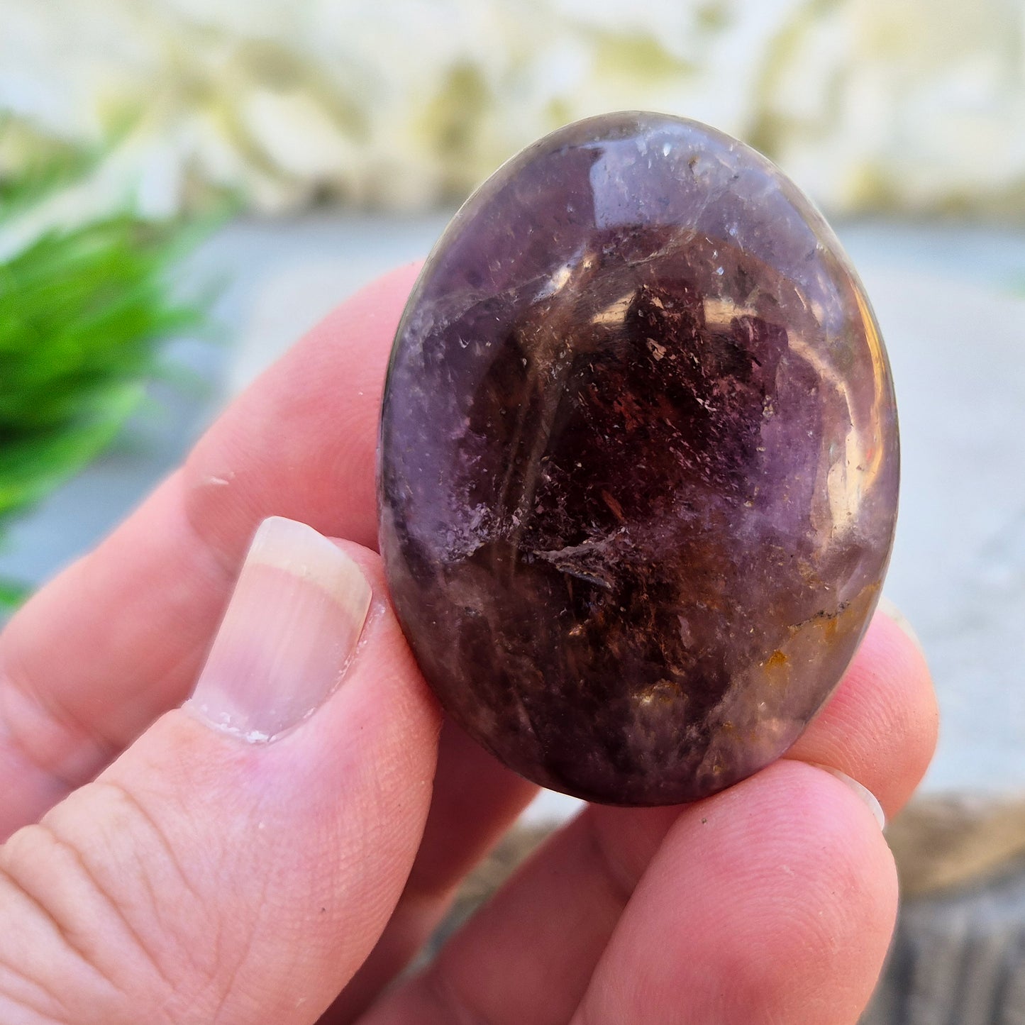 Ametrine polished palm stone with soft purple and golden tones. A natural blend of Amethyst and Citrine with a balanced, easy feel. 