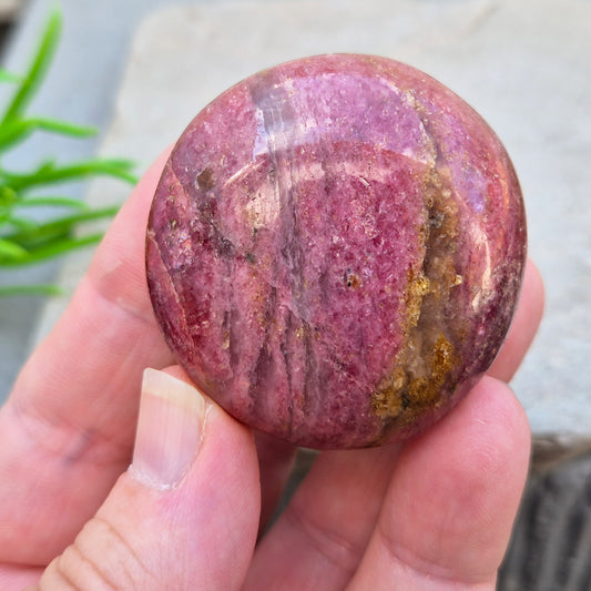 Rhodonite: Known for its beautiful pink hues, this crystal supports emotional healing and personal growth, ideal for enhancing your spiritual practice.