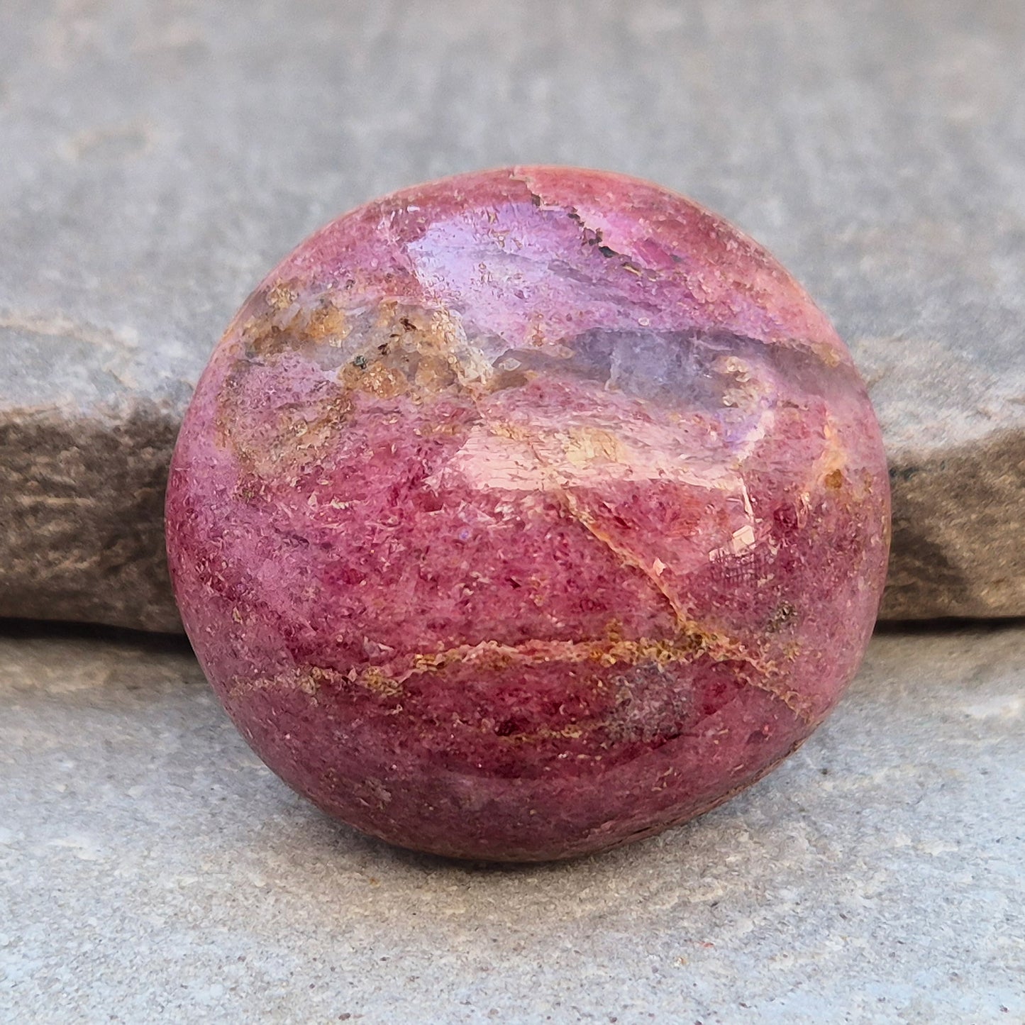 Rhodonite: Known for its beautiful pink hues, this crystal supports emotional healing and personal growth, ideal for enhancing your spiritual practice.
