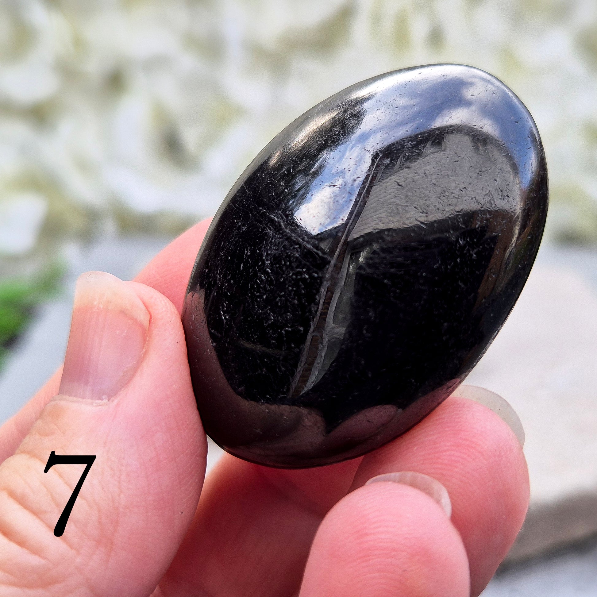 Black Tourmaline Palm Stone, Grounding and protective for everyday energy support. Ideal for shielding from negativity and promoting inner strength.