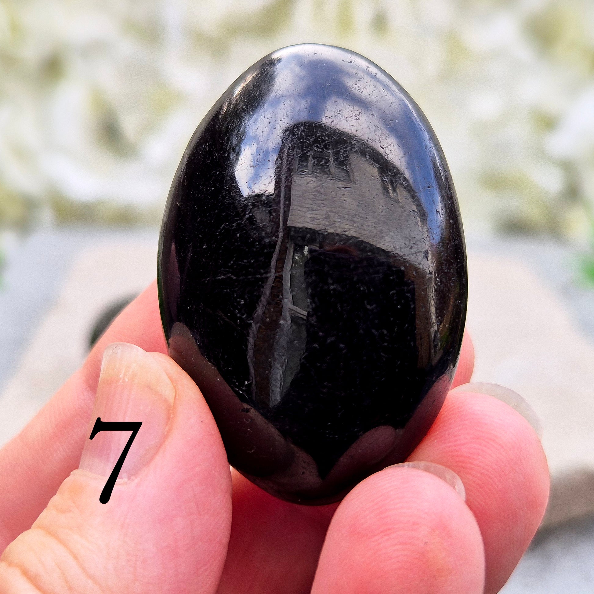 Black Tourmaline Palm Stone, Grounding and protective for everyday energy support. Ideal for shielding from negativity and promoting inner strength.