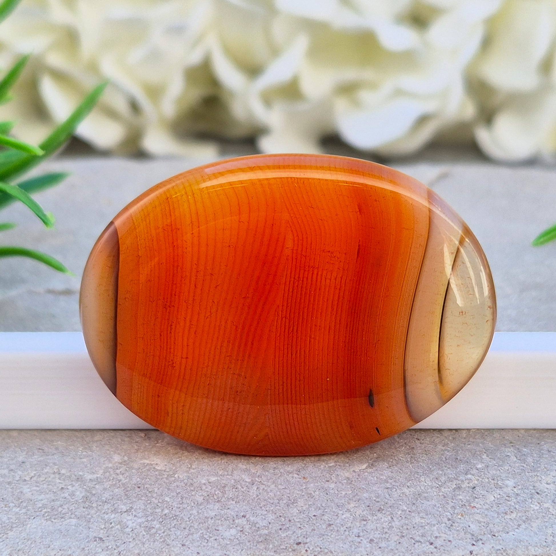 Banded Carnelian palm stone from Madagascar. Boosts motivation, confidence and creativity. Grounding Root and Sacral crystal for energy and focus