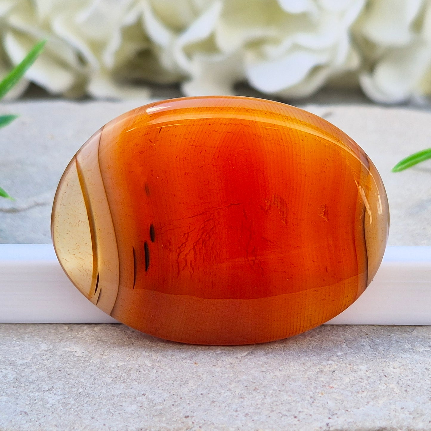 Banded Carnelian palm stone from Madagascar. Boosts motivation, confidence and creativity. Grounding Root and Sacral crystal for energy and focus