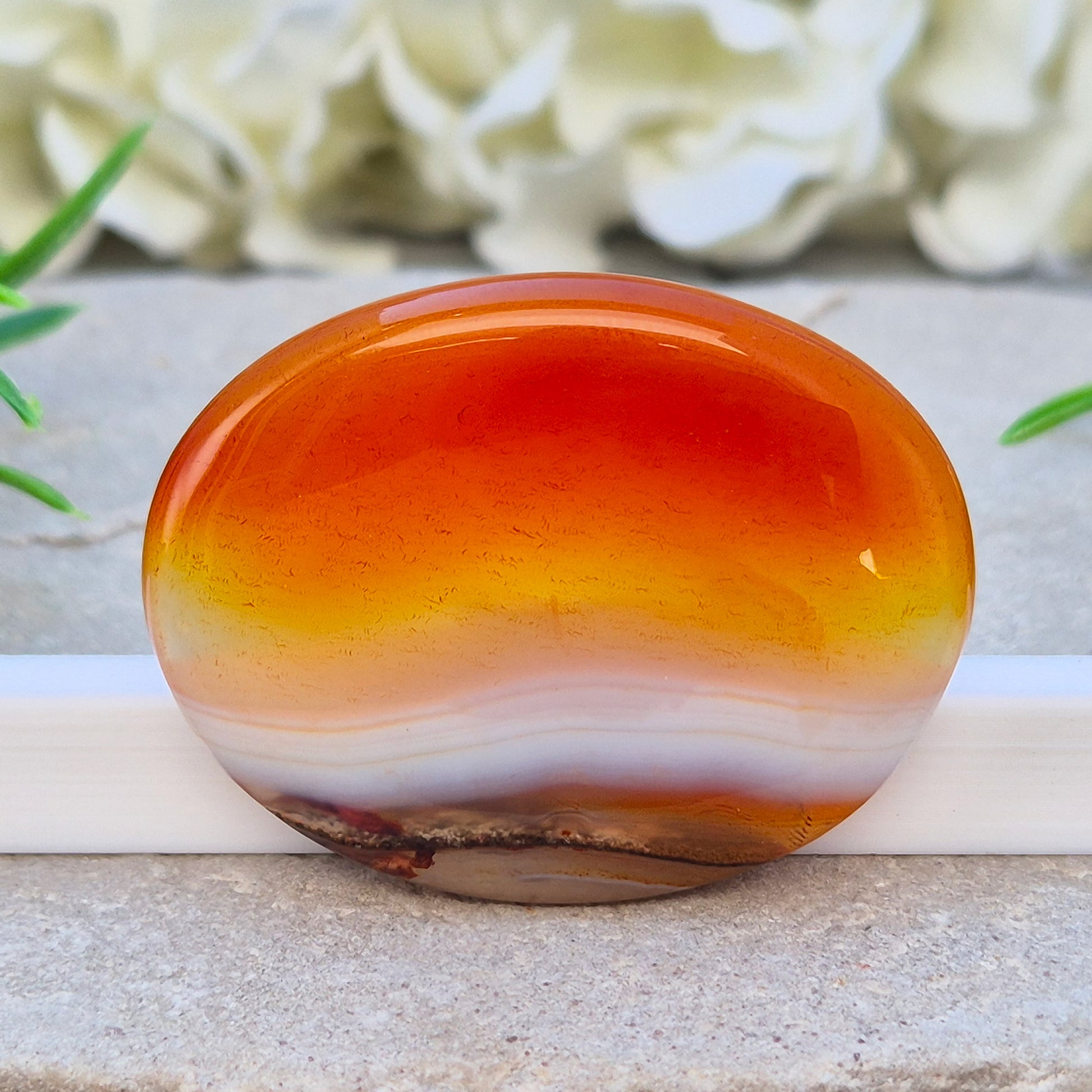 Banded Carnelian palm stone from Madagascar. Boosts motivation, confidence and creativity. Grounding Root and Sacral crystal for energy and focus