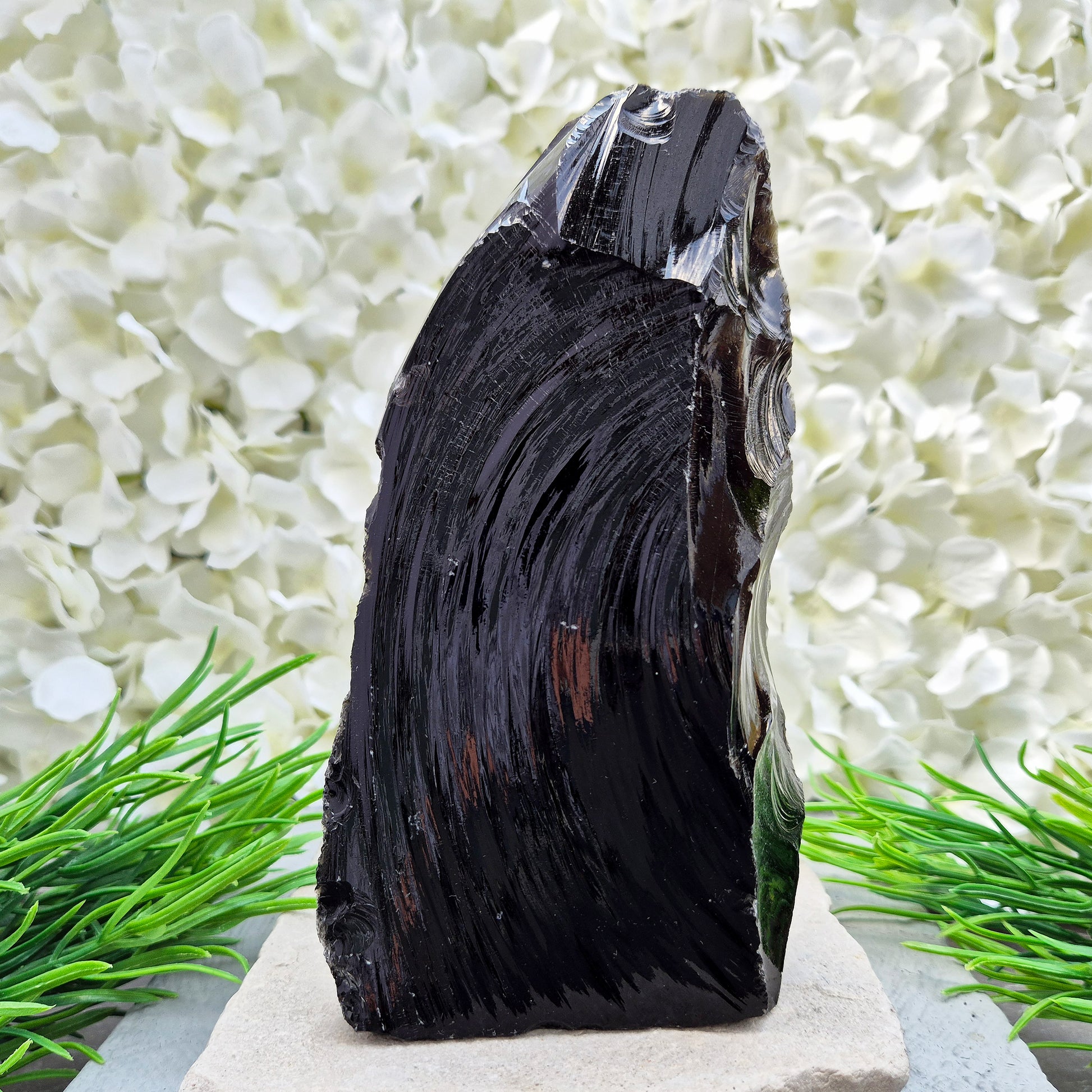 This Black Obsidian freeform has all natural sides and a cut base so it will self stand, highlighting its raw volcanic structure. Fabulous home decor piece.