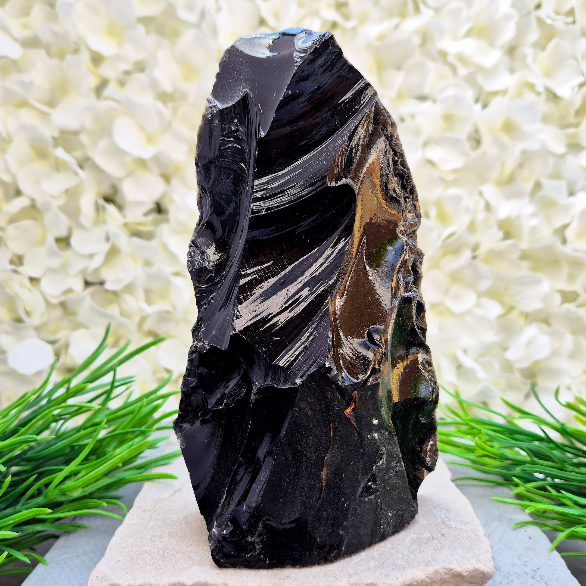 This Black Obsidian freeform has all natural sides and a cut base so it will self stand, highlighting its raw volcanic structure. Fabulous home decor piece.