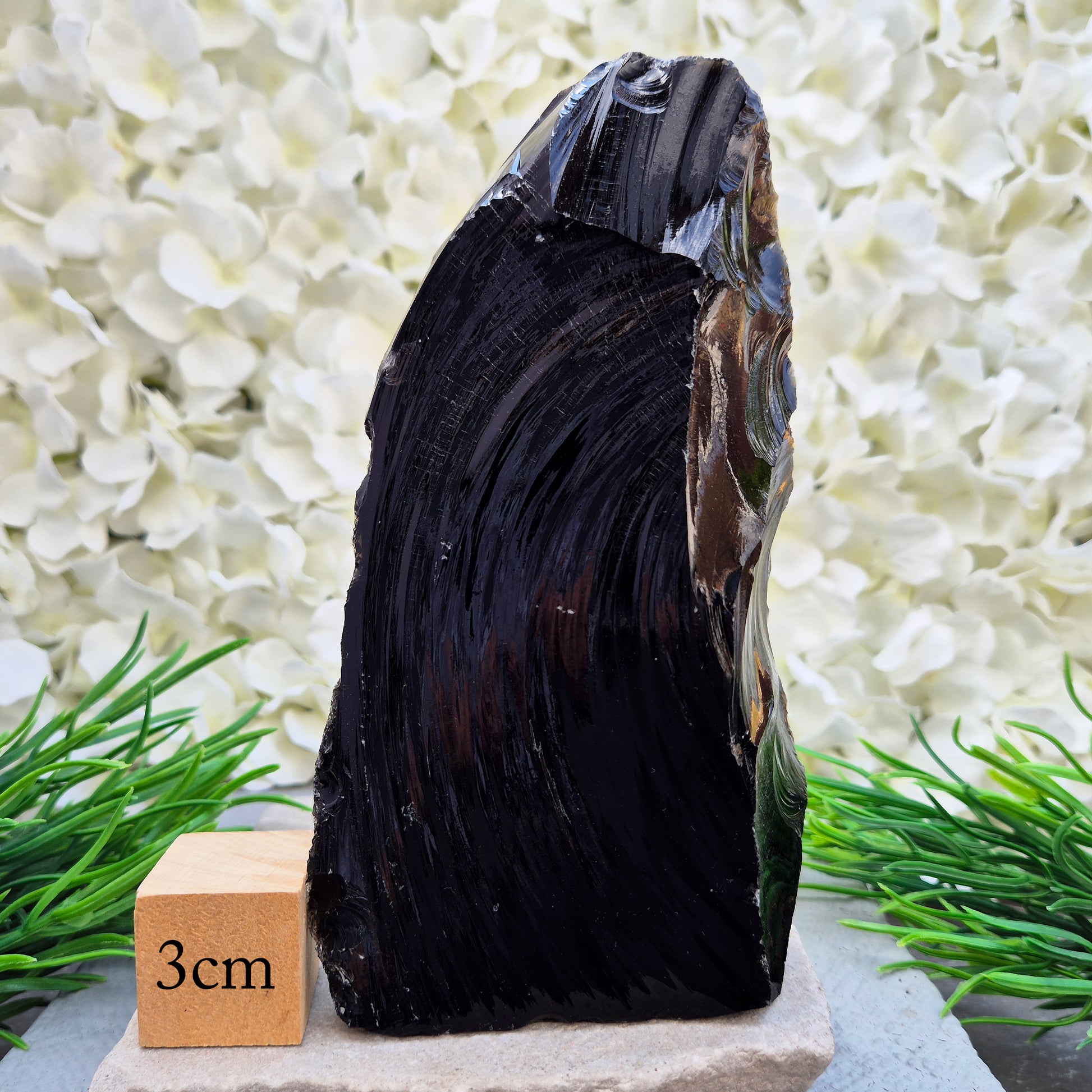 This Black Obsidian freeform has all natural sides and a cut base so it will self stand, highlighting its raw volcanic structure. Fabulous home decor piece.