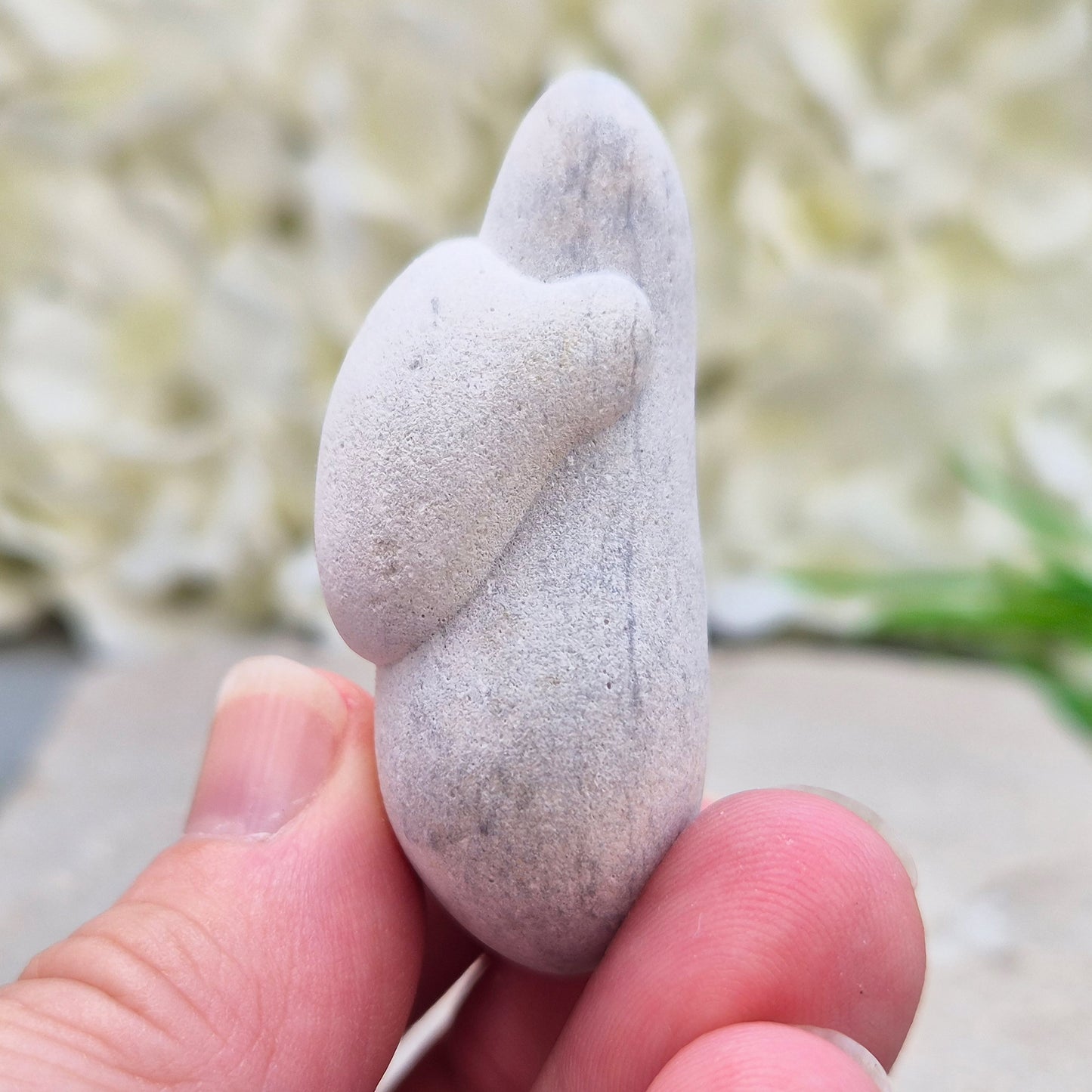 Menalite Crystal Freeform from Morocco.&nbsp;this natural Menalite freeform is a fluid, organically shaped piece with a soft, chalky feel in the hand. Also known as the Goddess Stone or Fairy Stone and has a soft, earthy energy.