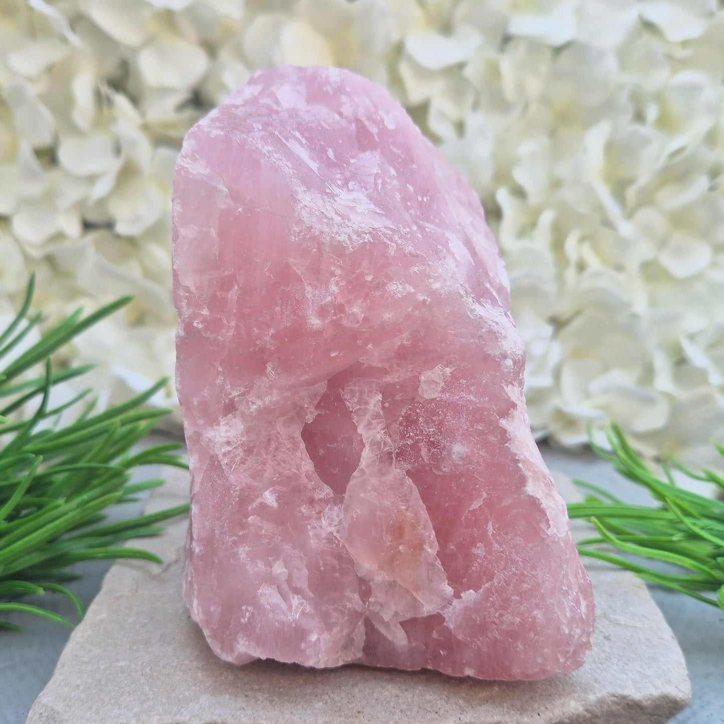Natural Rose Quartz crystal to display in your home. Promotes calm, self-love, and emotional balance while bringing harmony to your space.