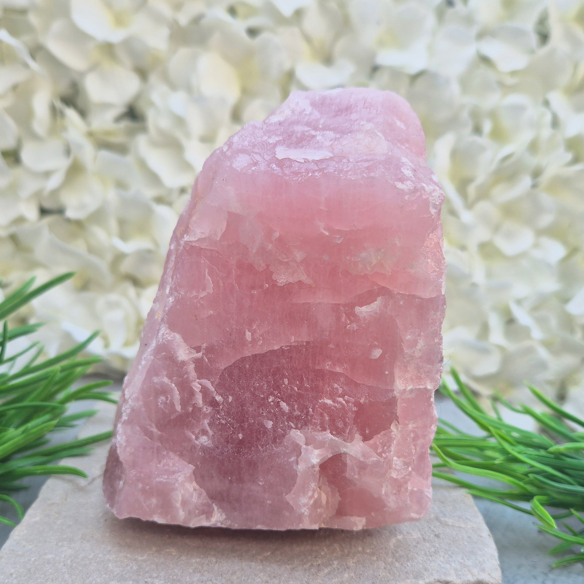 Natural Rose Quartz crystal to display in your home. Promotes calm, self-love, and emotional balance while bringing harmony to your space.