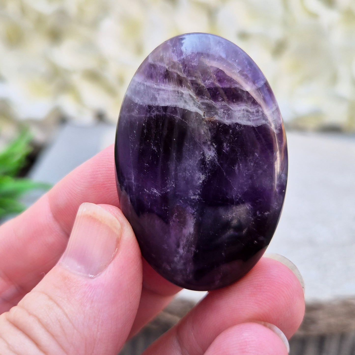 Amethyst Palm Stone with deep purple tones. A soothing crystal for balance, peaceful energy, and gentle spiritual connection. 