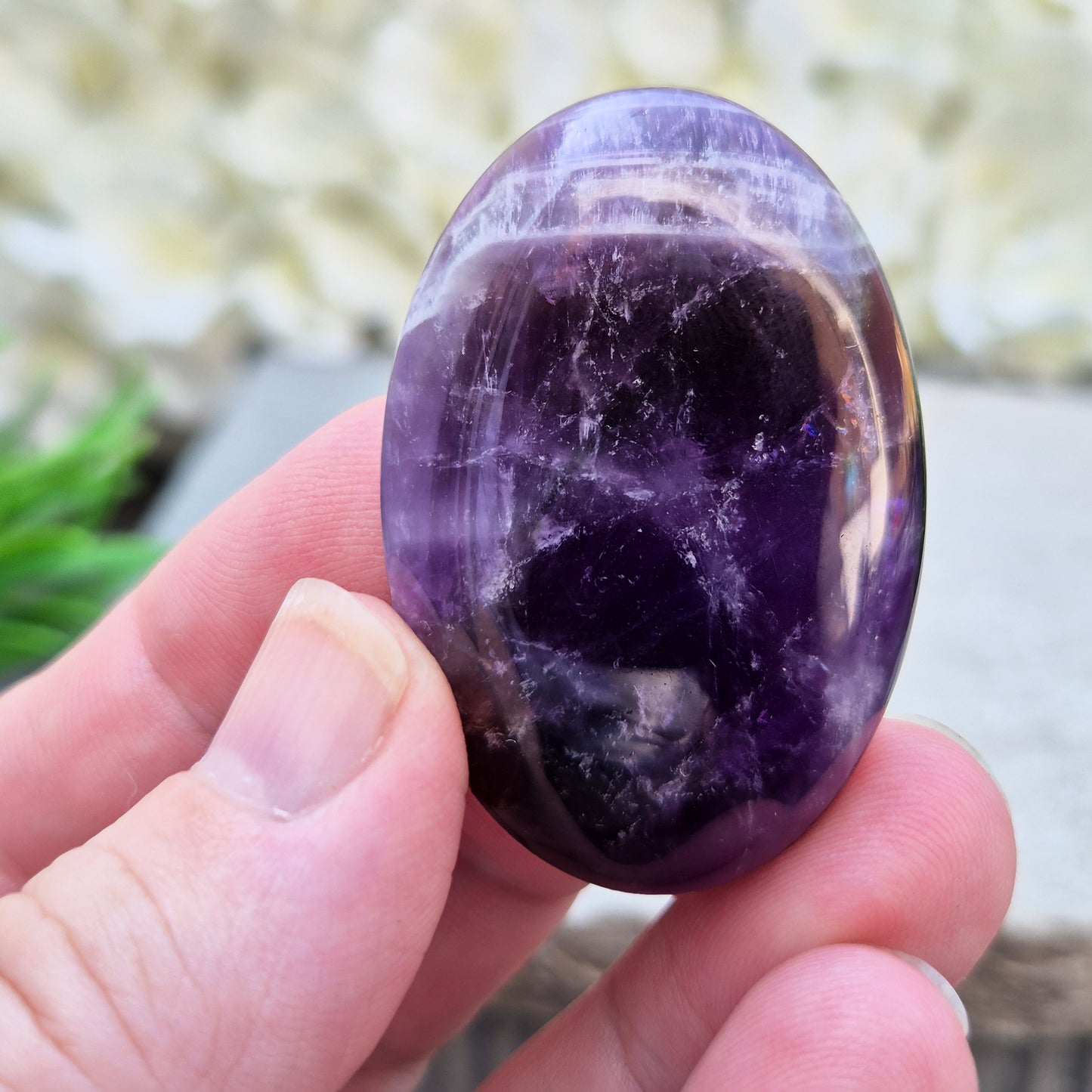 Amethyst Palm Stone with deep purple tones. A soothing crystal for balance, peaceful energy, and gentle spiritual connection. 