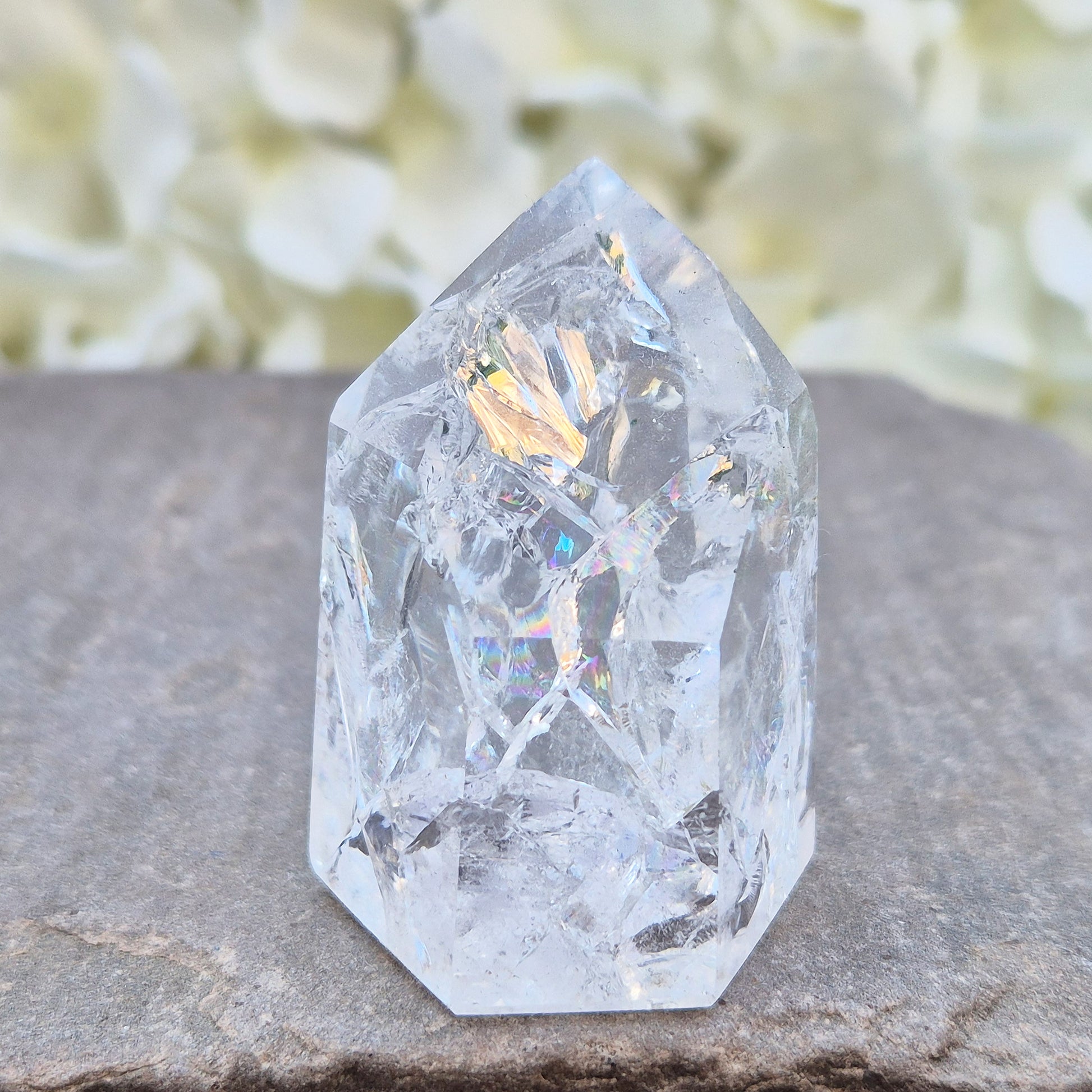 Fire and Ice Quartz polished point with striking internal crackle patterns. A high-energy crystal for amplification, focus, and energising your space.