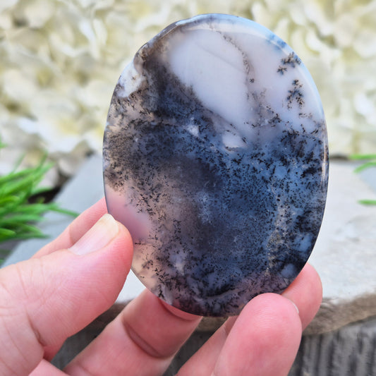 Merlinite Palm Stone - a grounding and intuitive crystal for meditation, inner balance and spiritual work. Smooth pocket stone for daily calm energy.