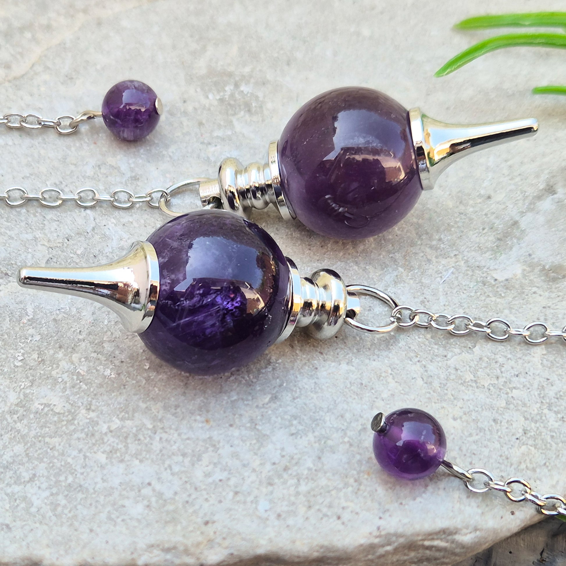 Amethyst pendulum with ball, ideal for dowsing, divination, and energy work. A beautiful tool for spiritual practice, tarot readings, and crystal healing.