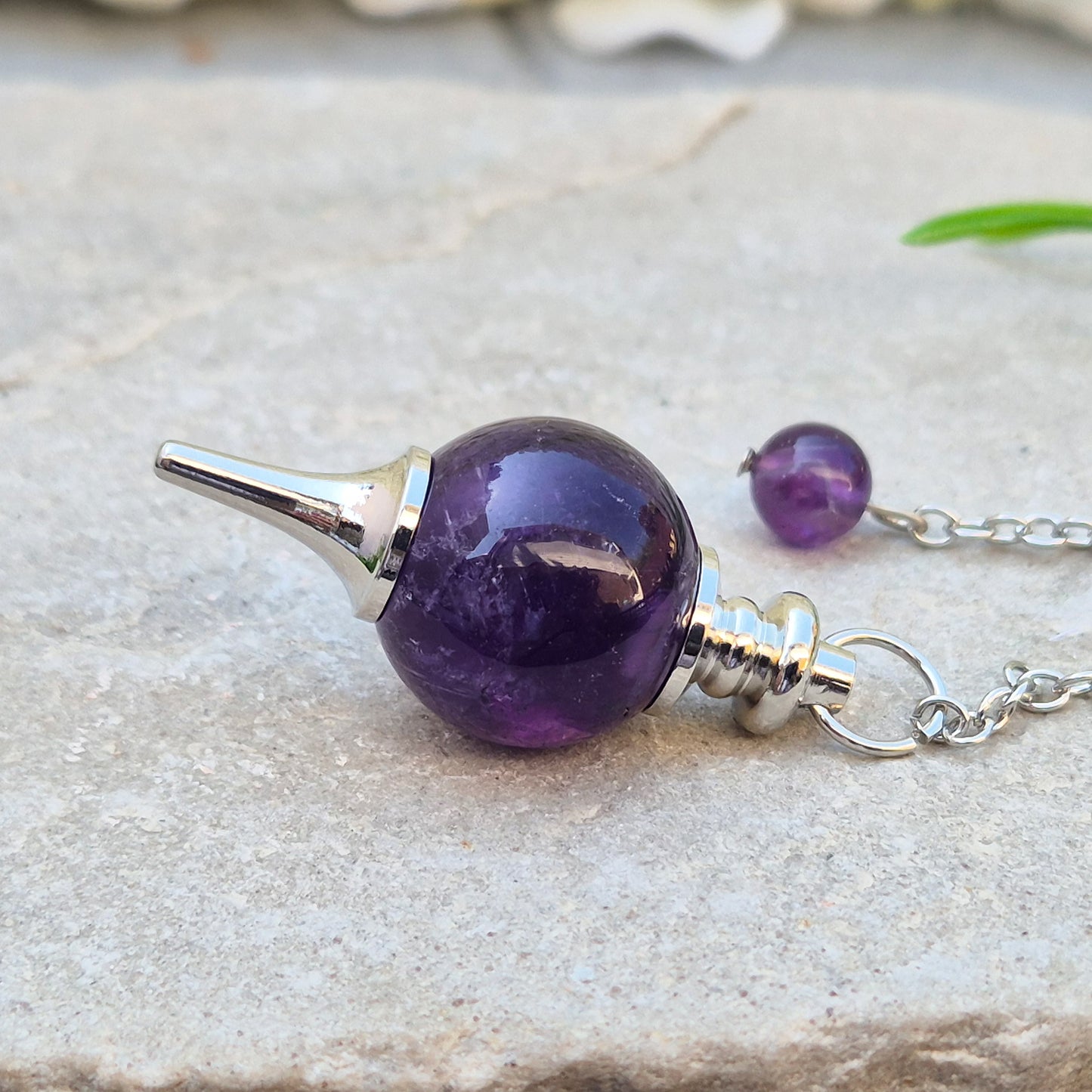 Amethyst pendulum with ball, ideal for dowsing, divination, and energy work. A beautiful tool for spiritual practice, tarot readings, and crystal healing.