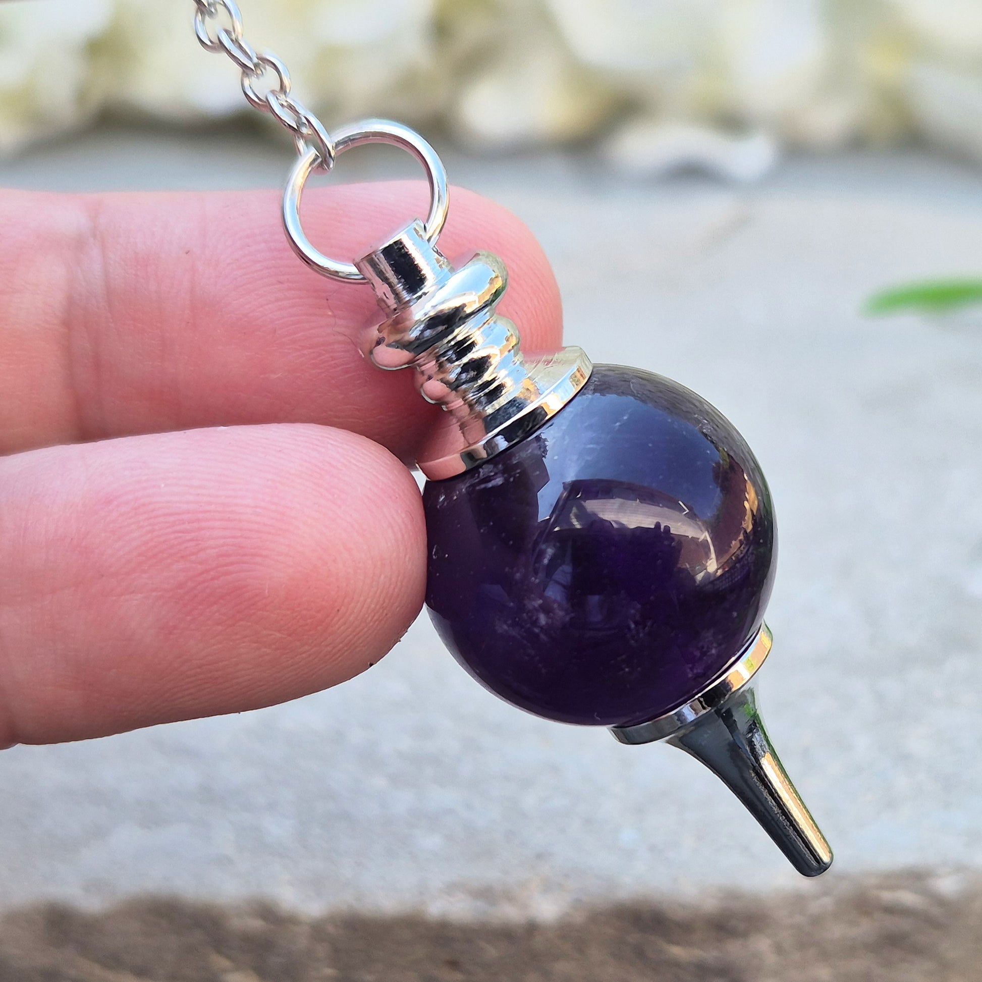 Amethyst pendulum with ball, ideal for dowsing, divination, and energy work. A beautiful tool for spiritual practice, tarot readings, and crystal healing.