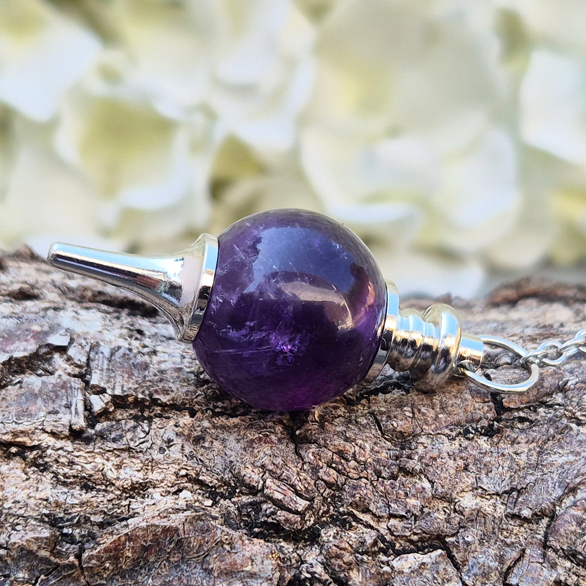 Amethyst pendulum with ball, ideal for dowsing, divination, and energy work. A beautiful tool for spiritual practice, tarot readings, and crystal healing.