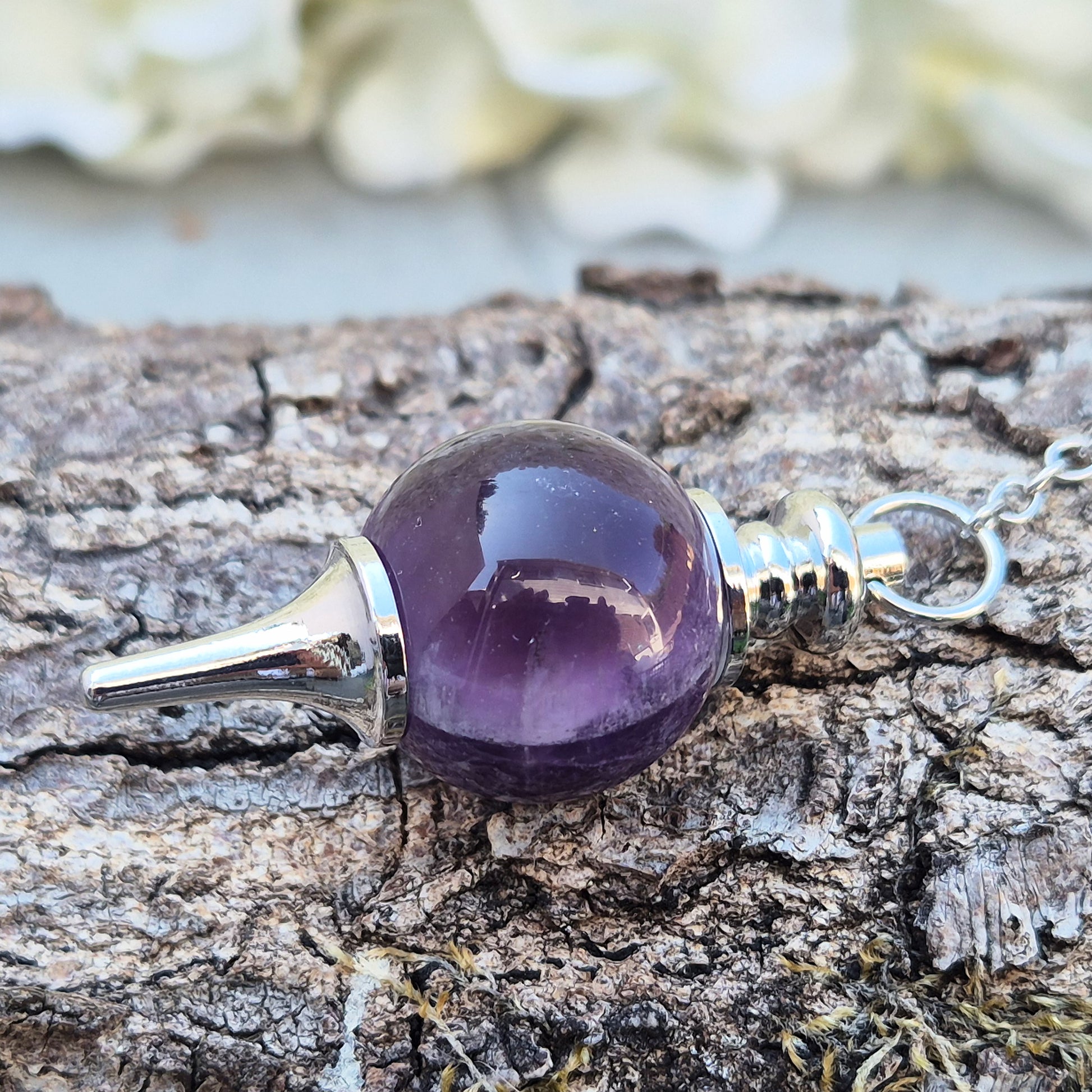 Amethyst pendulum with ball, ideal for dowsing, divination, and energy work. A beautiful tool for spiritual practice, tarot readings, and crystal healing.