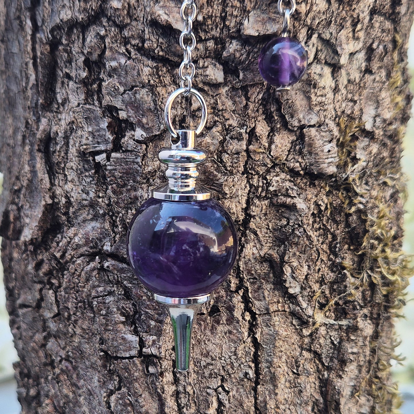 Amethyst pendulum with ball, ideal for dowsing, divination, and energy work. A beautiful tool for spiritual practice, tarot readings, and crystal healing.